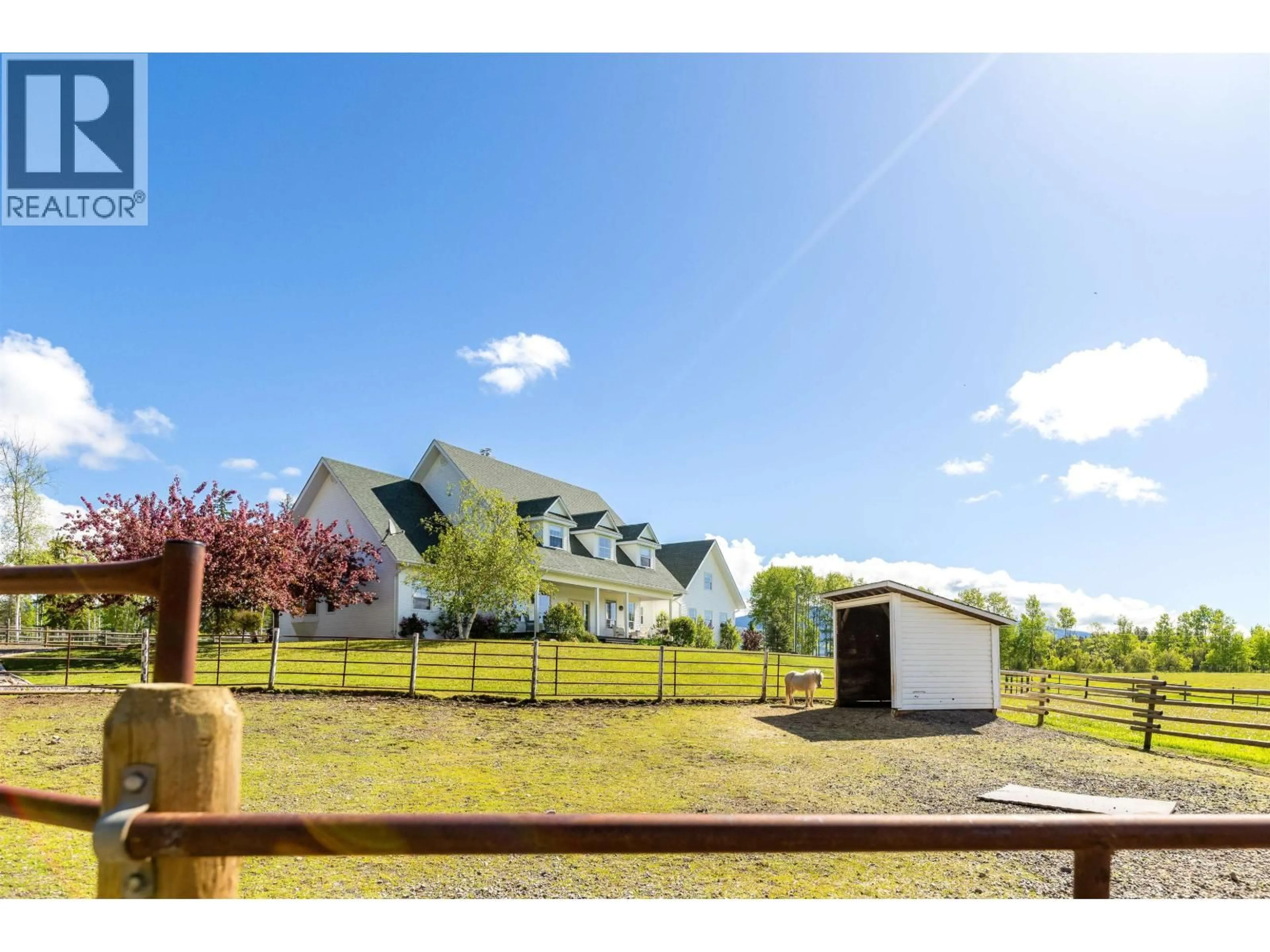 A pic from outside/outdoor area/front of a property/back of a property/a pic from drone, unknown for 9146 ENGMAN ROAD, Smithers British Columbia V0J2N1
