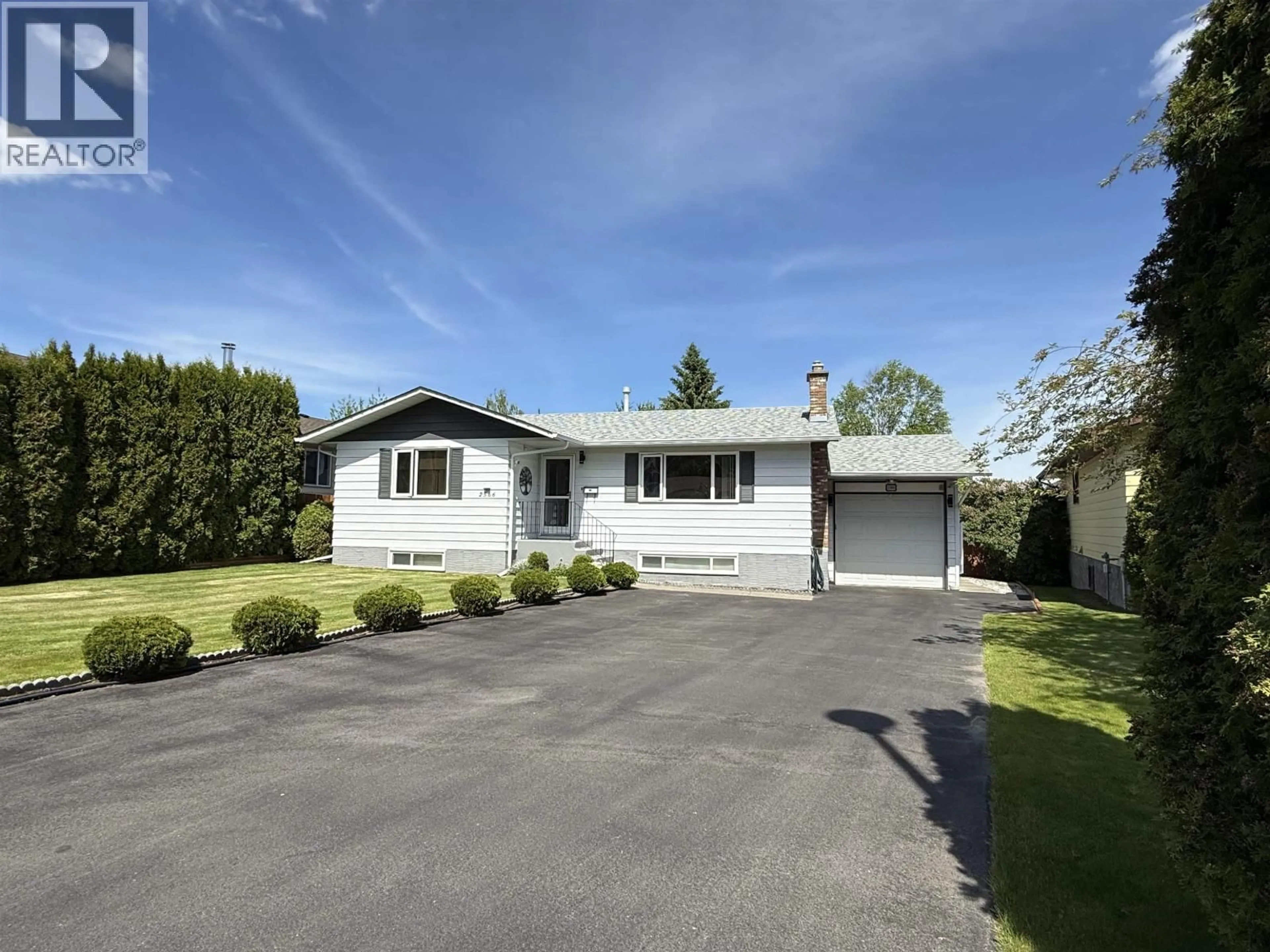 Home with vinyl exterior material, street for 2566 COYLE STREET, Prince George British Columbia V2N3Y6