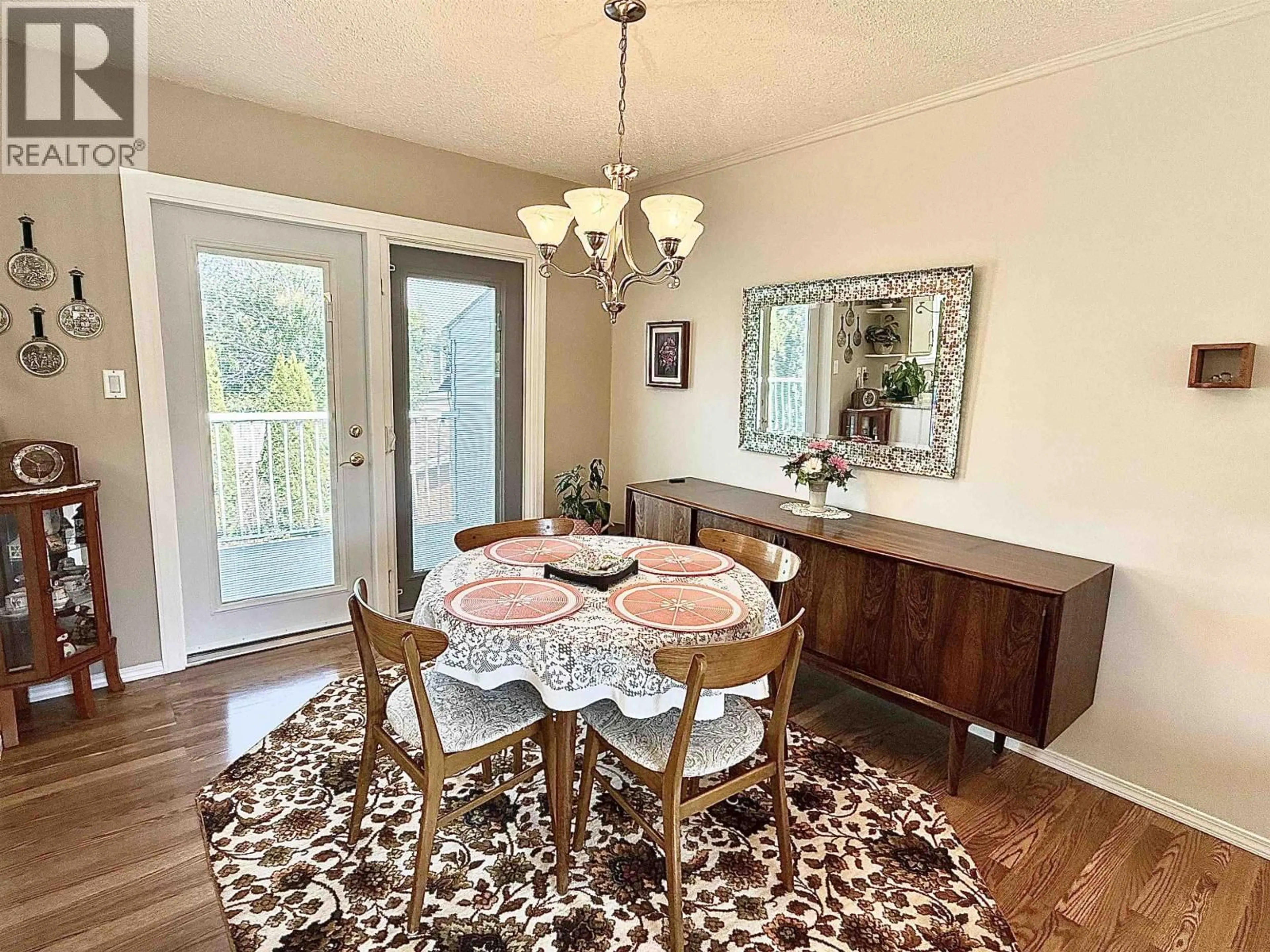 Dining room, wood/laminate floor for 2566 COYLE STREET, Prince George British Columbia V2N3Y6