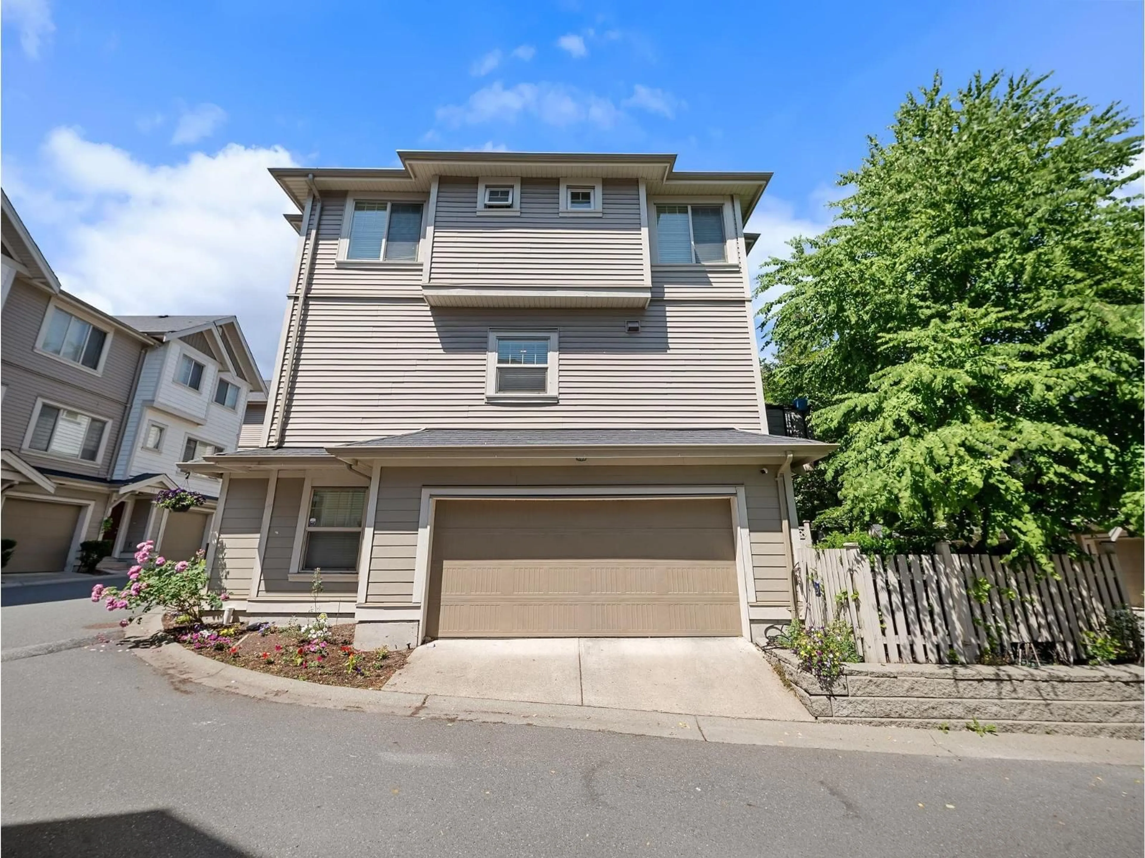 A pic from outside/outdoor area/front of a property/back of a property/a pic from drone, street for 13 - 19097 64 AVENUE, Surrey British Columbia V3S6X5