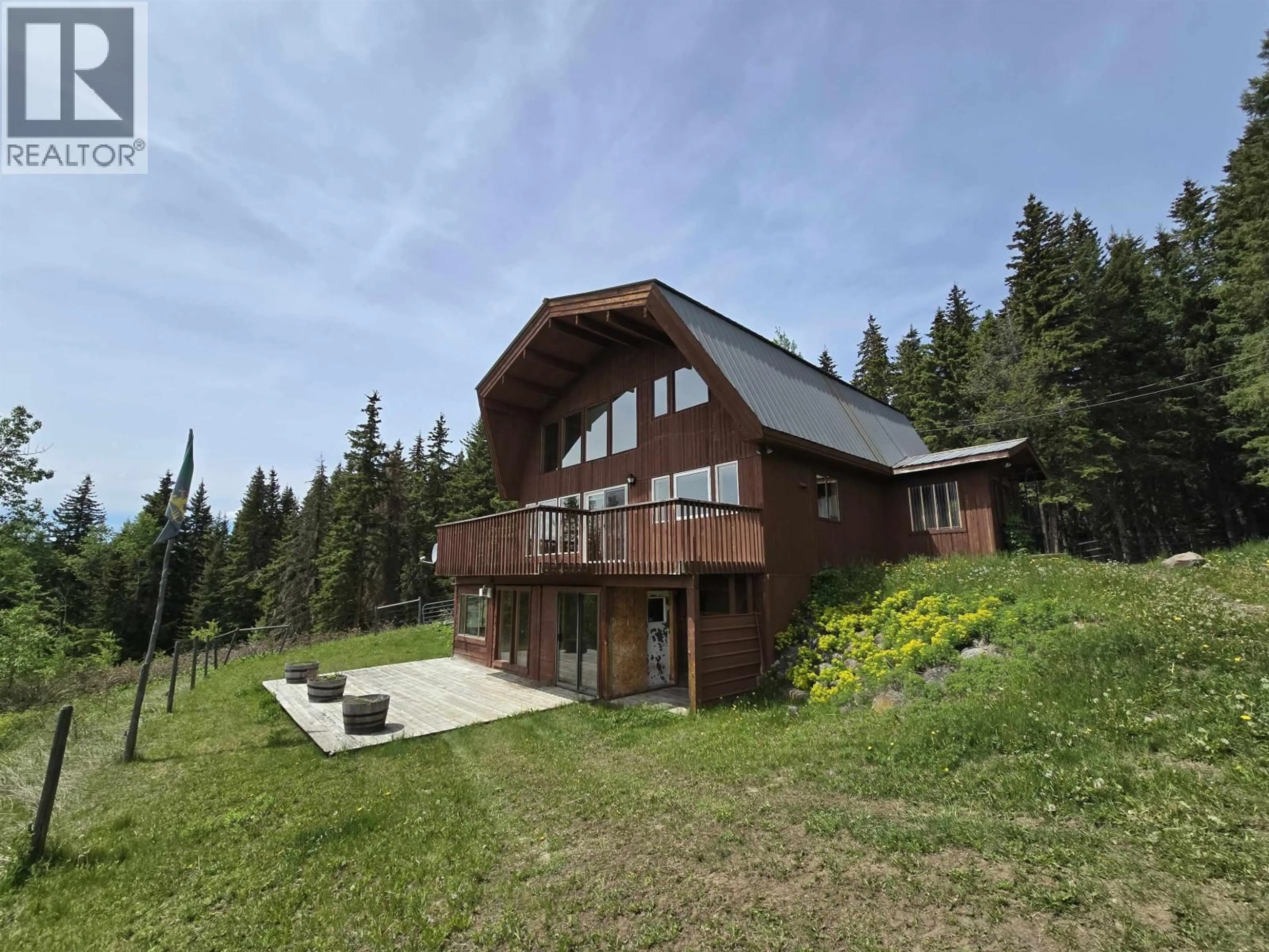A pic from outside/outdoor area/front of a property/back of a property/a pic from drone, mountain view for 8262 WILSON LAKE ROAD, Bridge Lake British Columbia V0K1X2