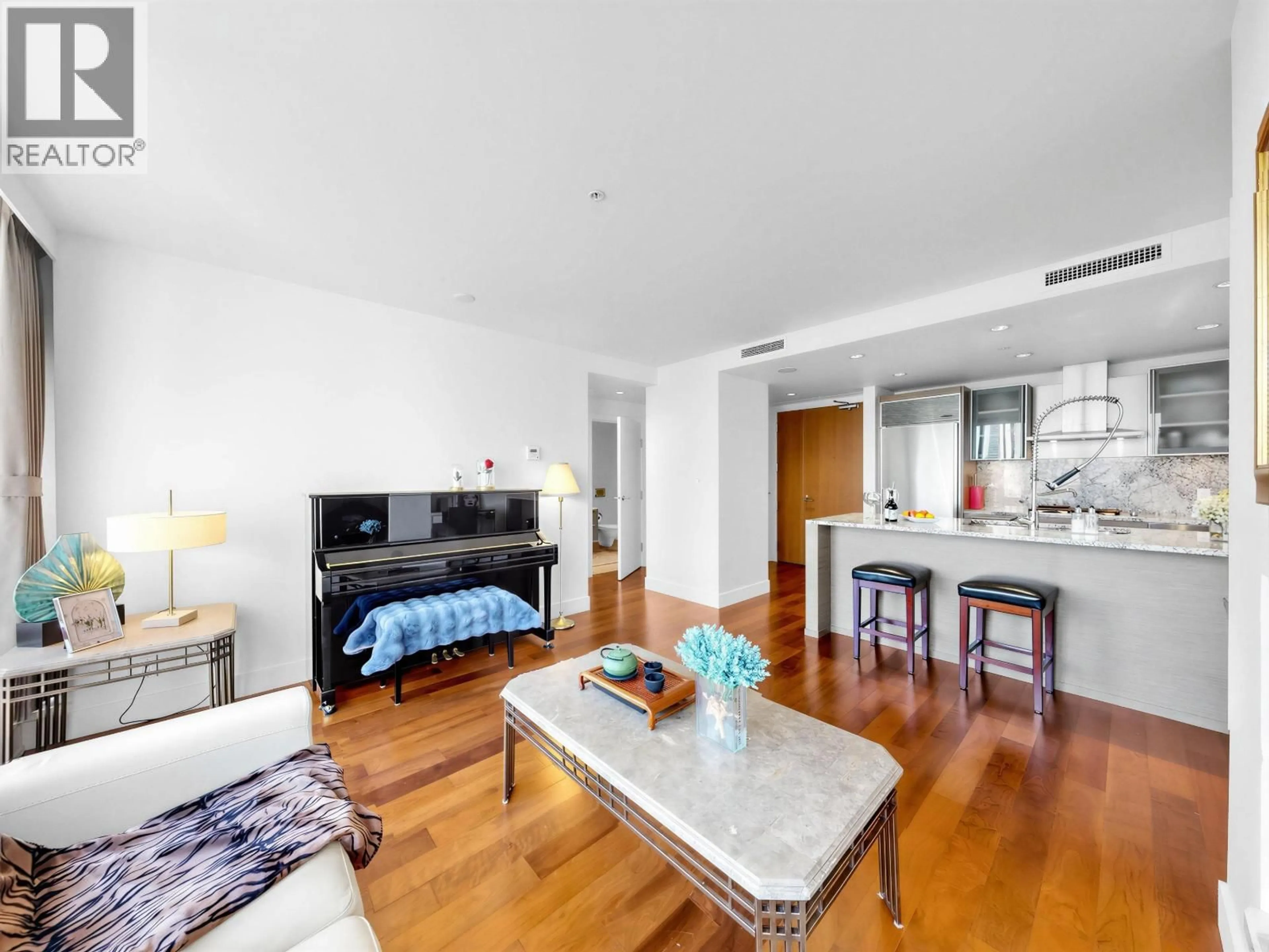 Living room with furniture, wood/laminate floor for 2407 - 1111 ALBERNI STREET, Vancouver British Columbia V6E4V2