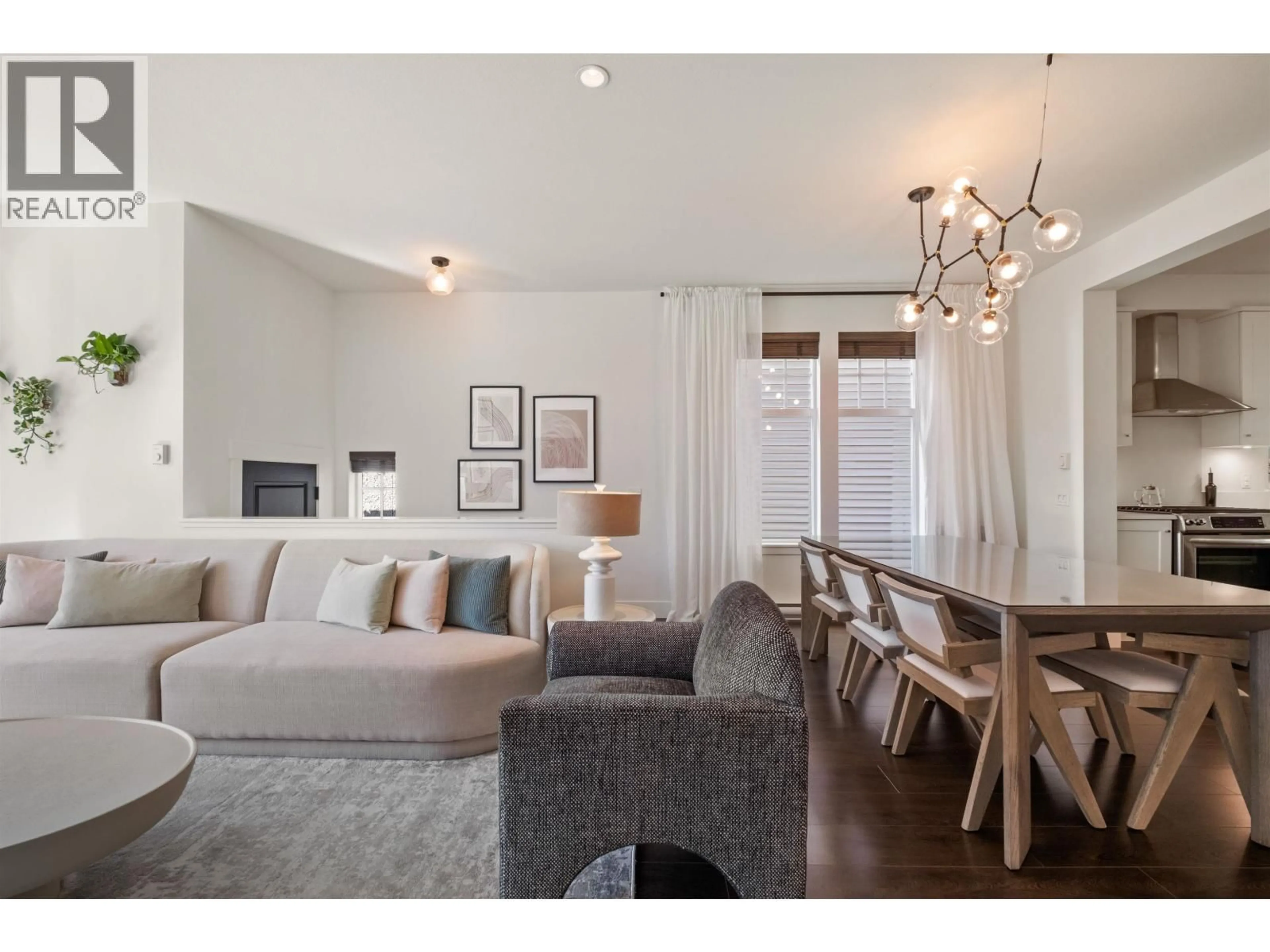Living room with furniture, wood/laminate floor for 1 - 3439 ROXTON AVENUE, Coquitlam British Columbia V3B3H7