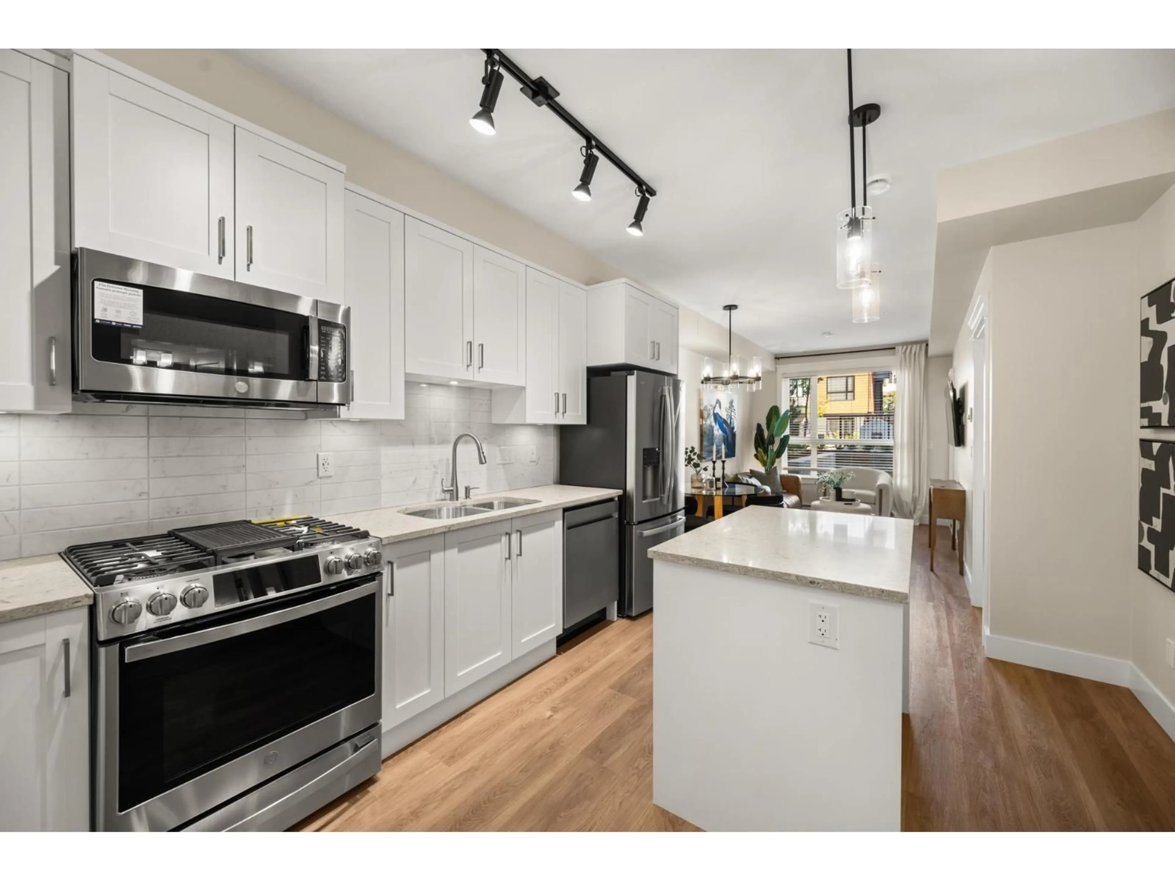 Open concept kitchen, unknown for 404 - 20926 83 AVENUE AVENUE, Langley British Columbia V2Y3Y9