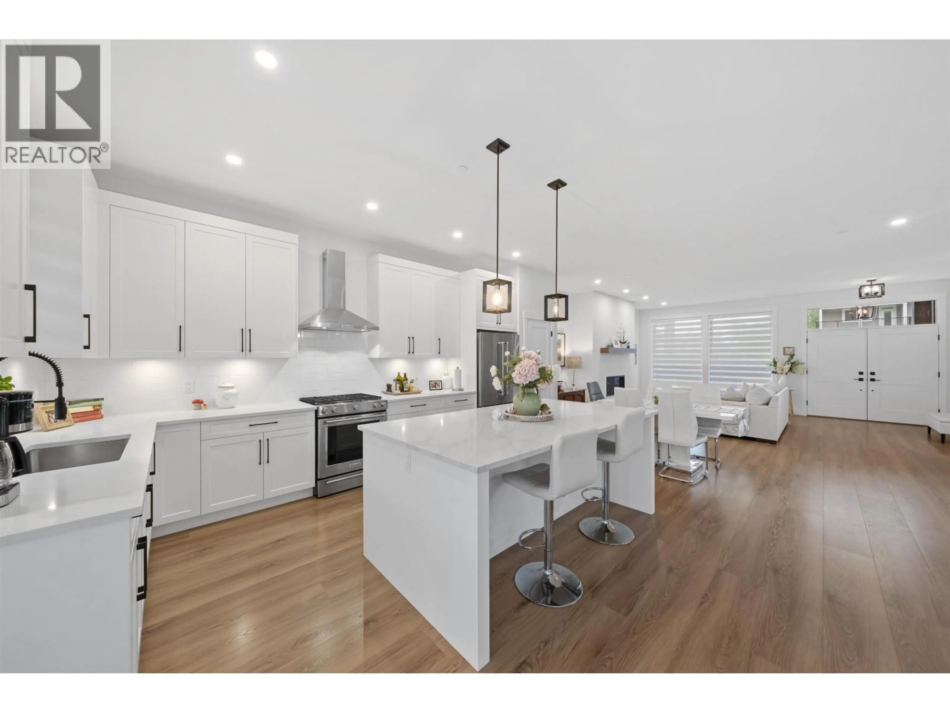 Open concept kitchen, wood/laminate floor for 13532 BIRDTAIL DRIVE, Maple Ridge British Columbia V4R0J2