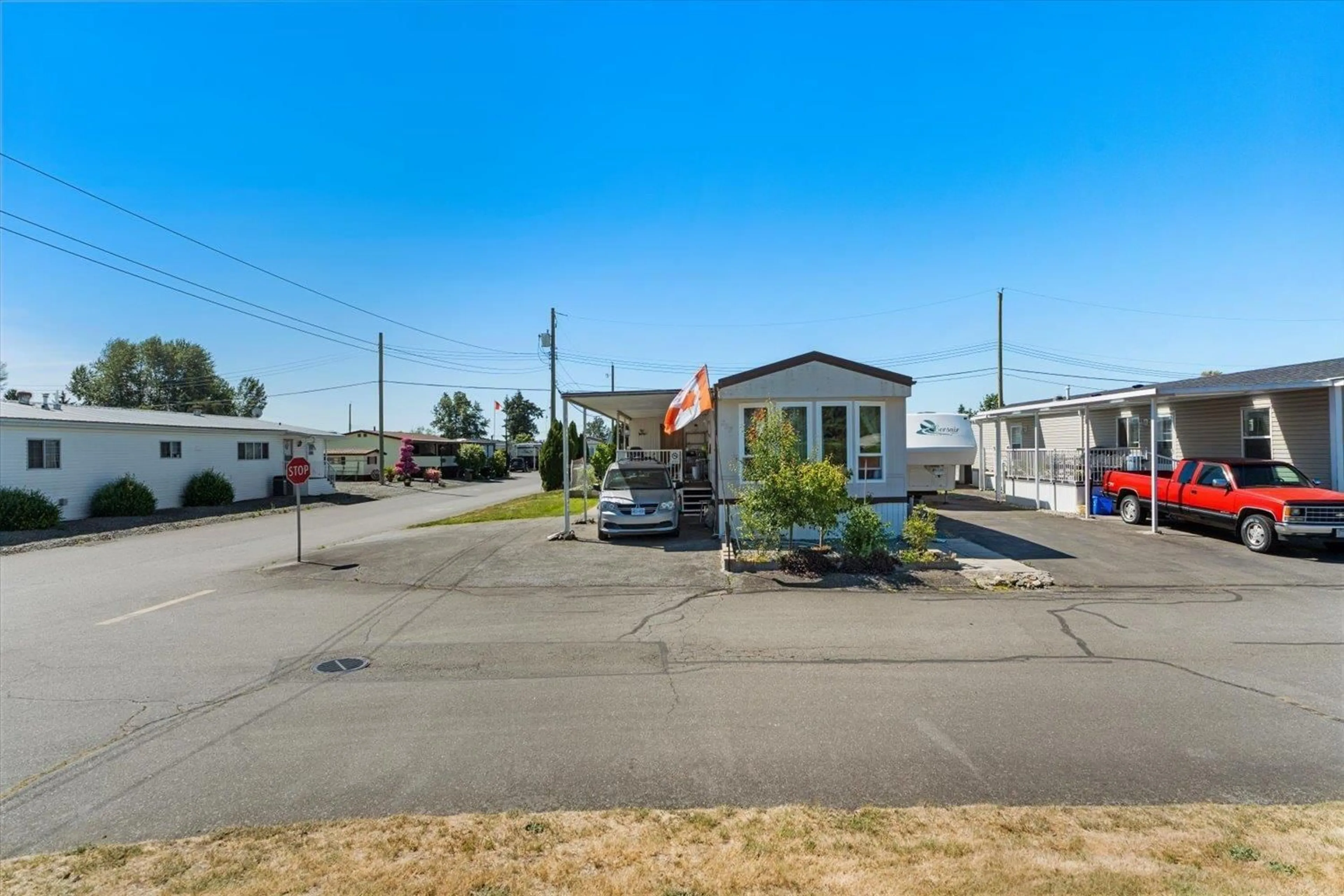 A pic from outside/outdoor area/front of a property/back of a property/a pic from drone, street for 217 - 27111 0 AVENUE, Langley British Columbia V4W2T5