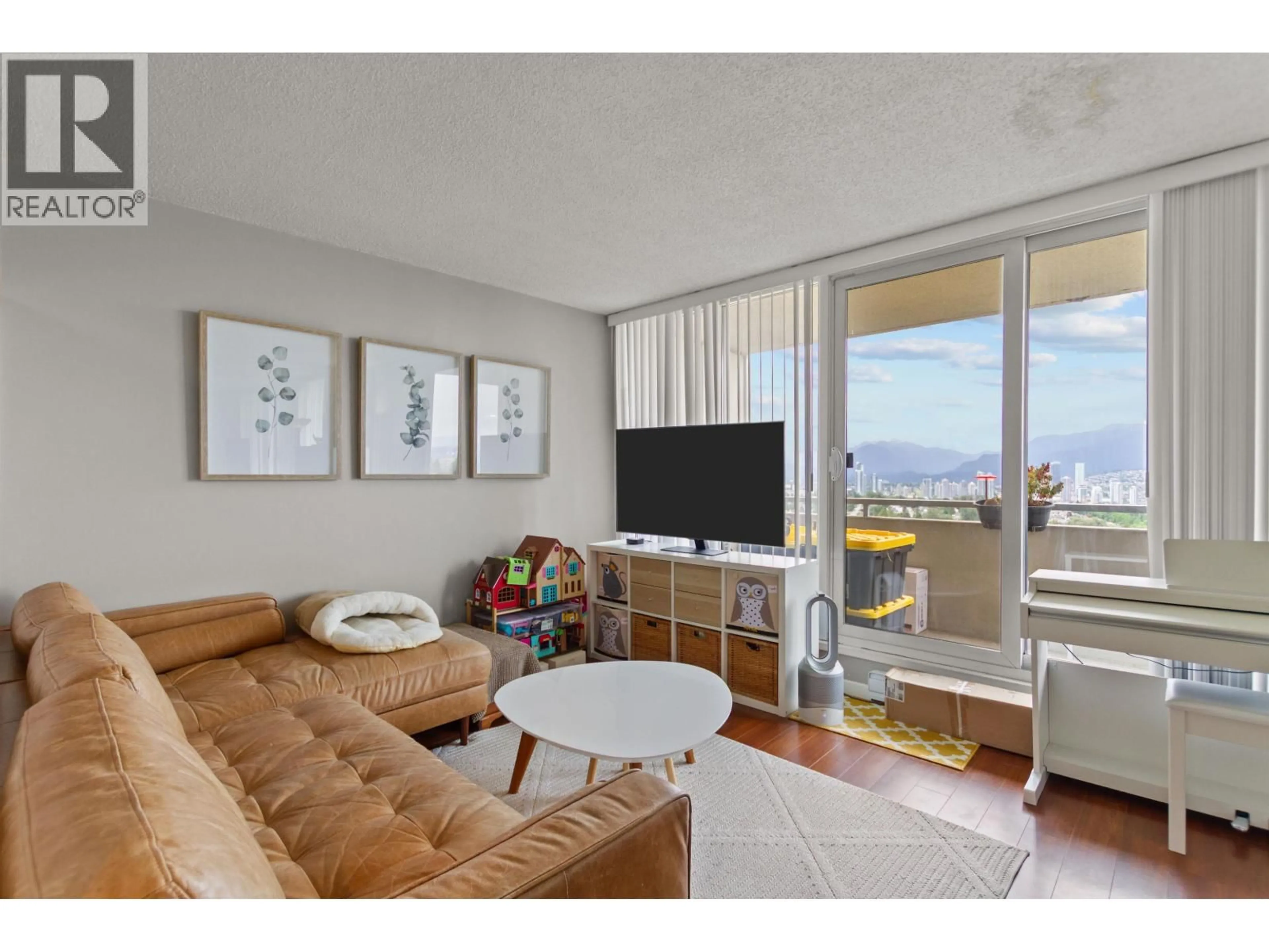 Living room with furniture, wood/laminate floor for 1203 - 5645 BARKER AVENUE, Burnaby British Columbia V5H3Z5