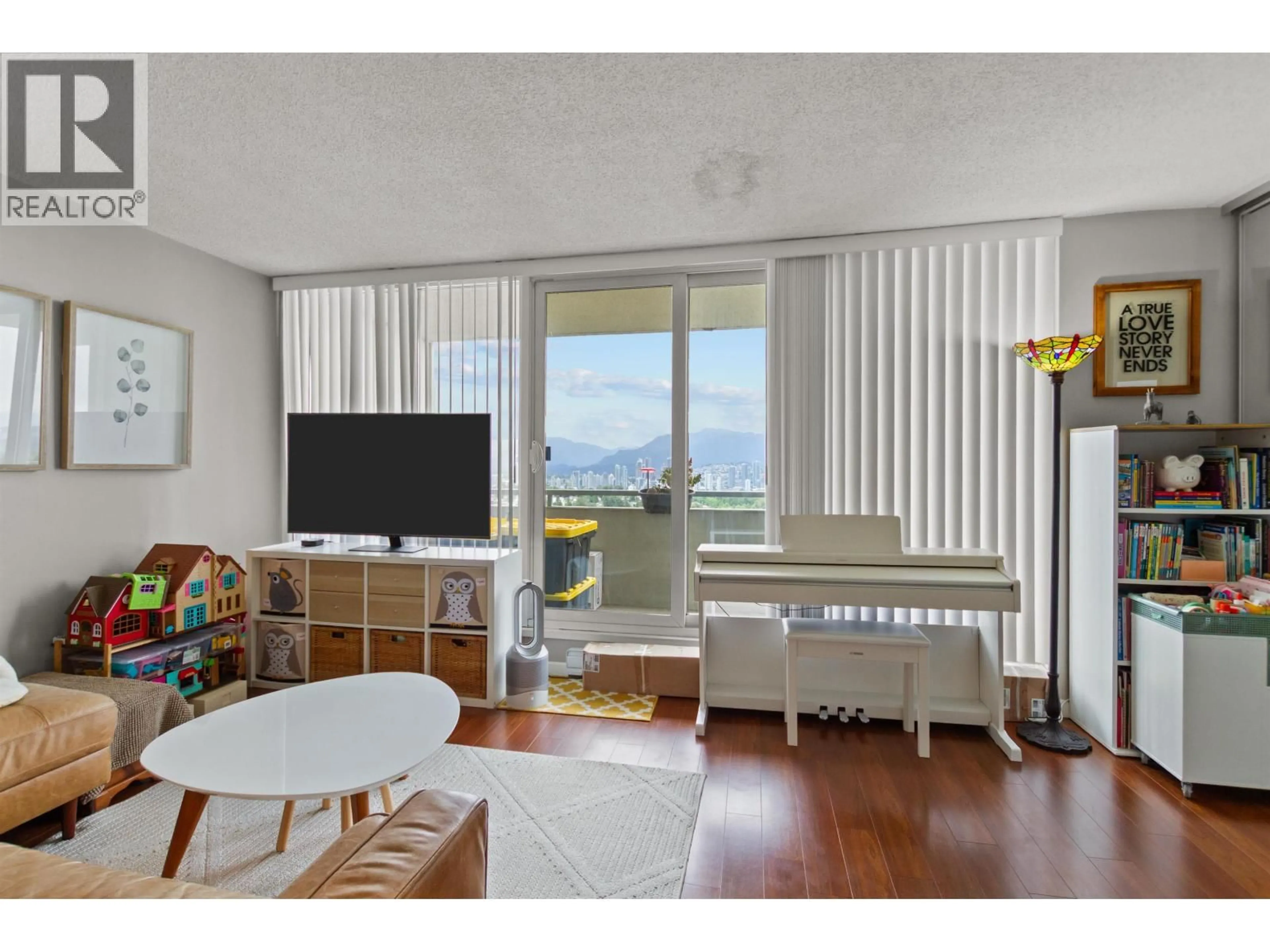 Living room with furniture, wood/laminate floor for 1203 - 5645 BARKER AVENUE, Burnaby British Columbia V5H3Z5