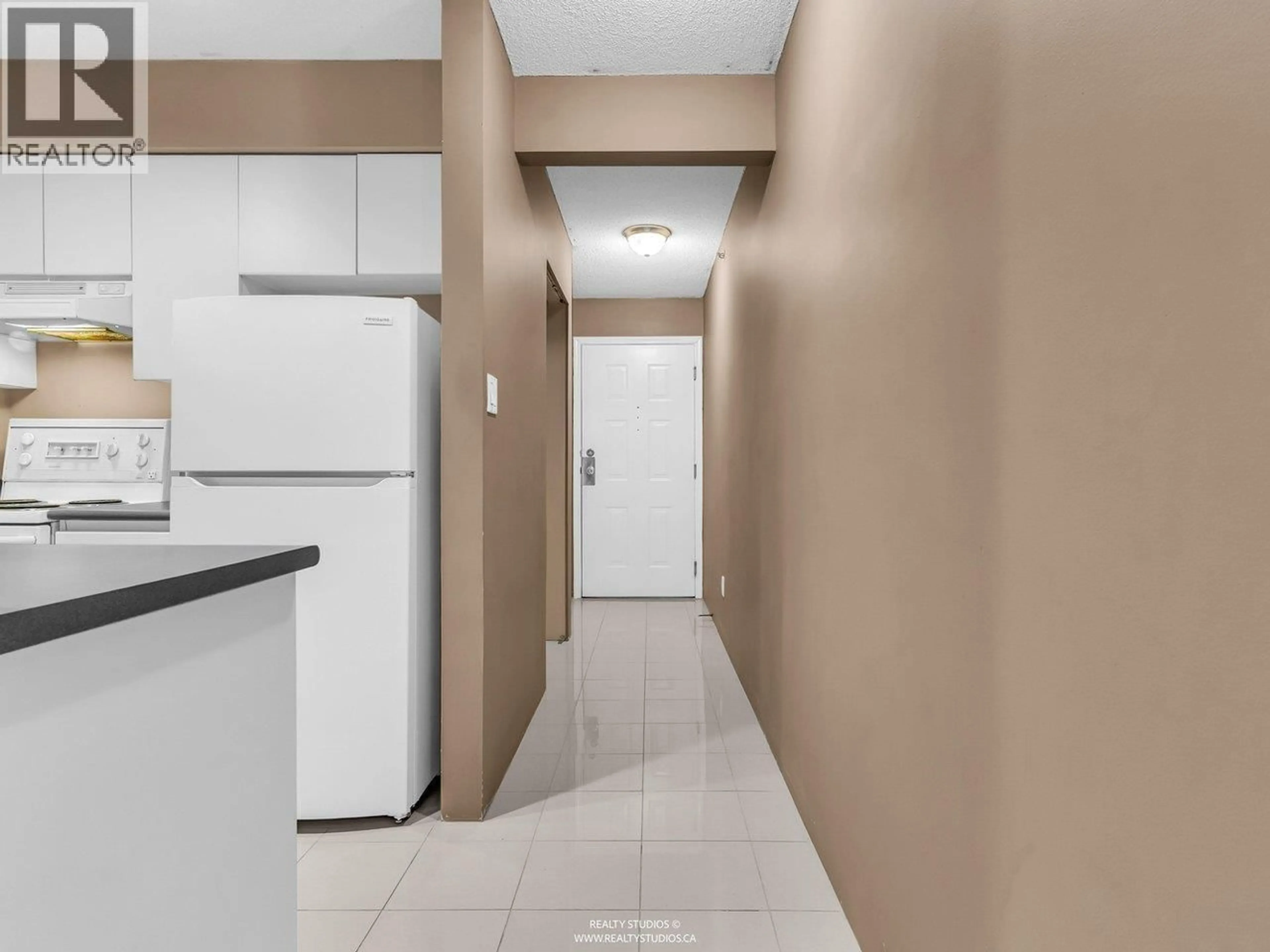 Standard kitchen, ceramic/tile floor for 206 - 3489 ASCOT PLACE, Vancouver British Columbia V5R6B6