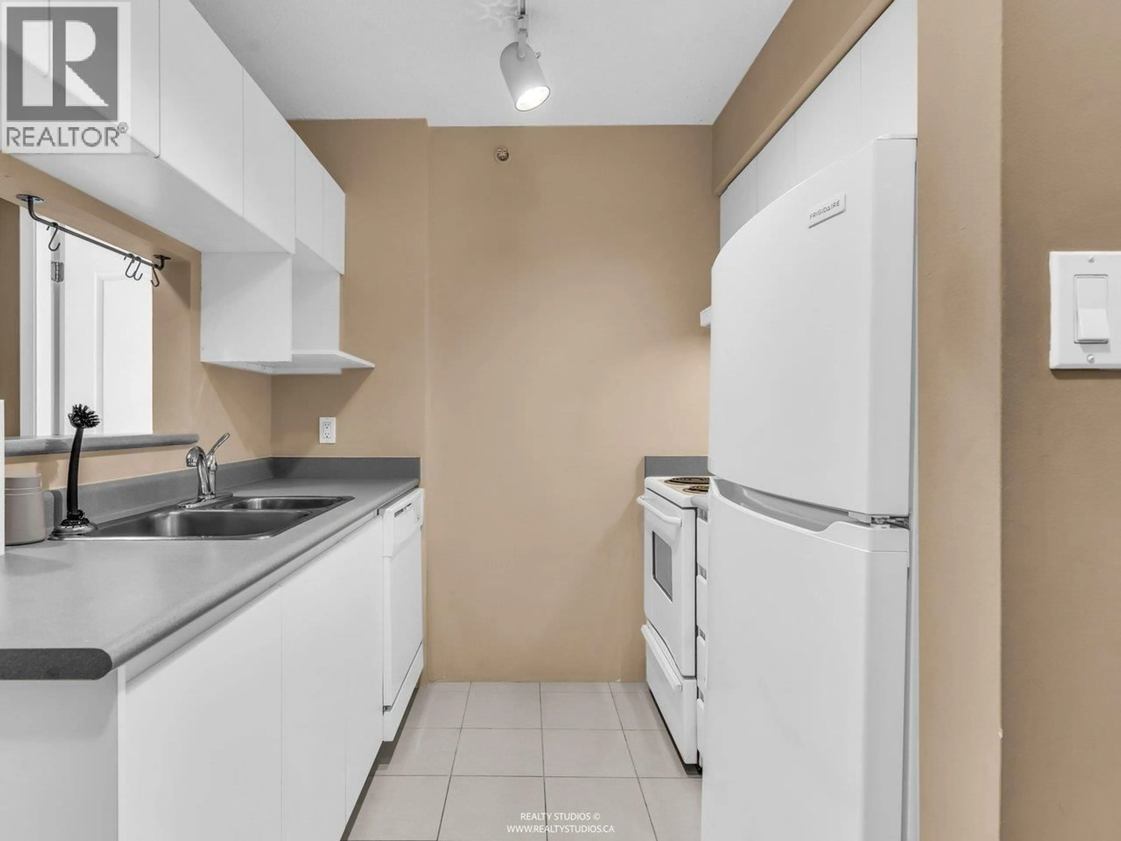 Standard kitchen, floor is not visible for 206 - 3489 ASCOT PLACE, Vancouver British Columbia V5R6B6