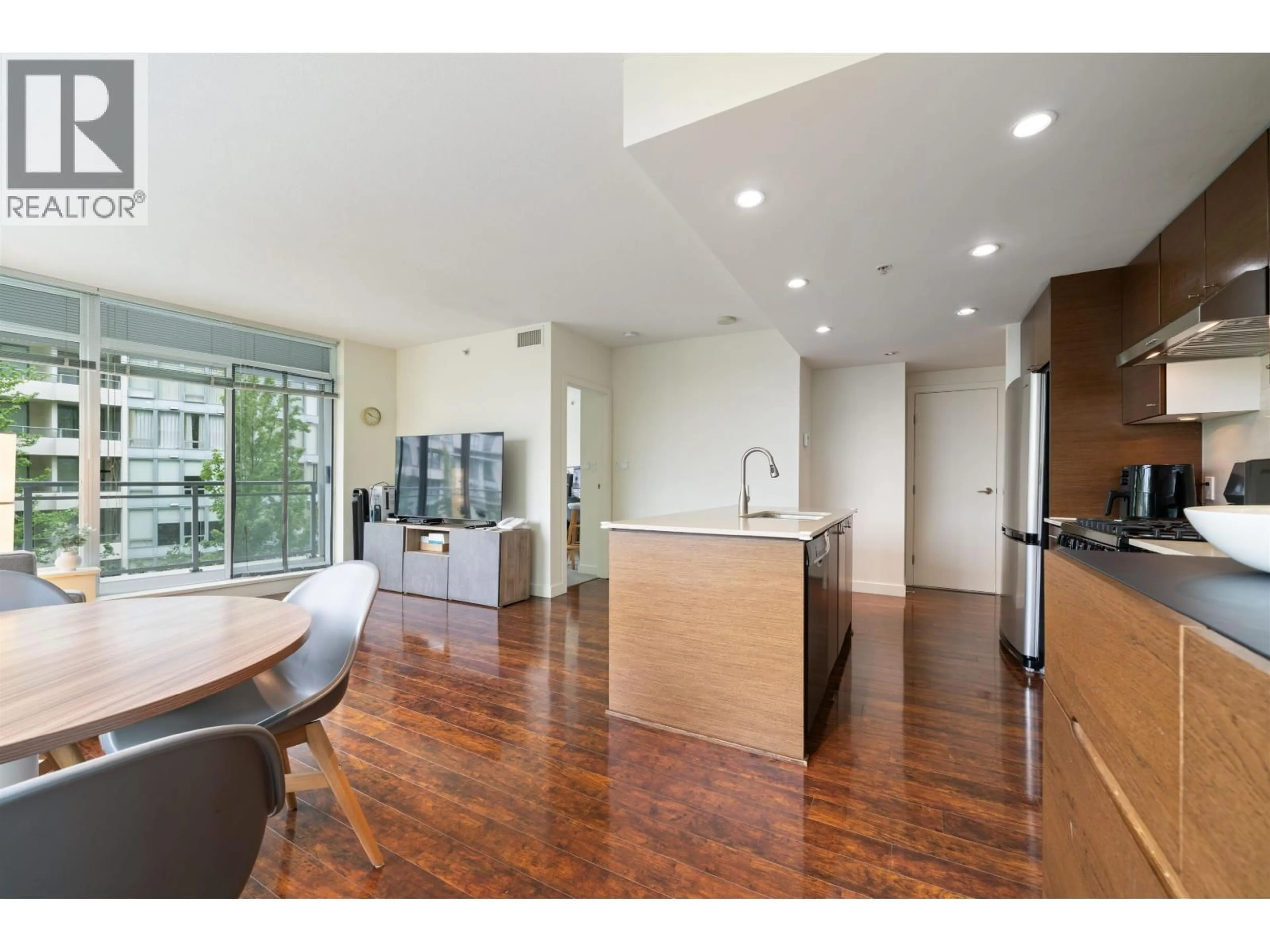 Open concept kitchen, wood/laminate floor for 608 - 5900 ALDERBRIDGE WAY, Richmond British Columbia V6X0B6