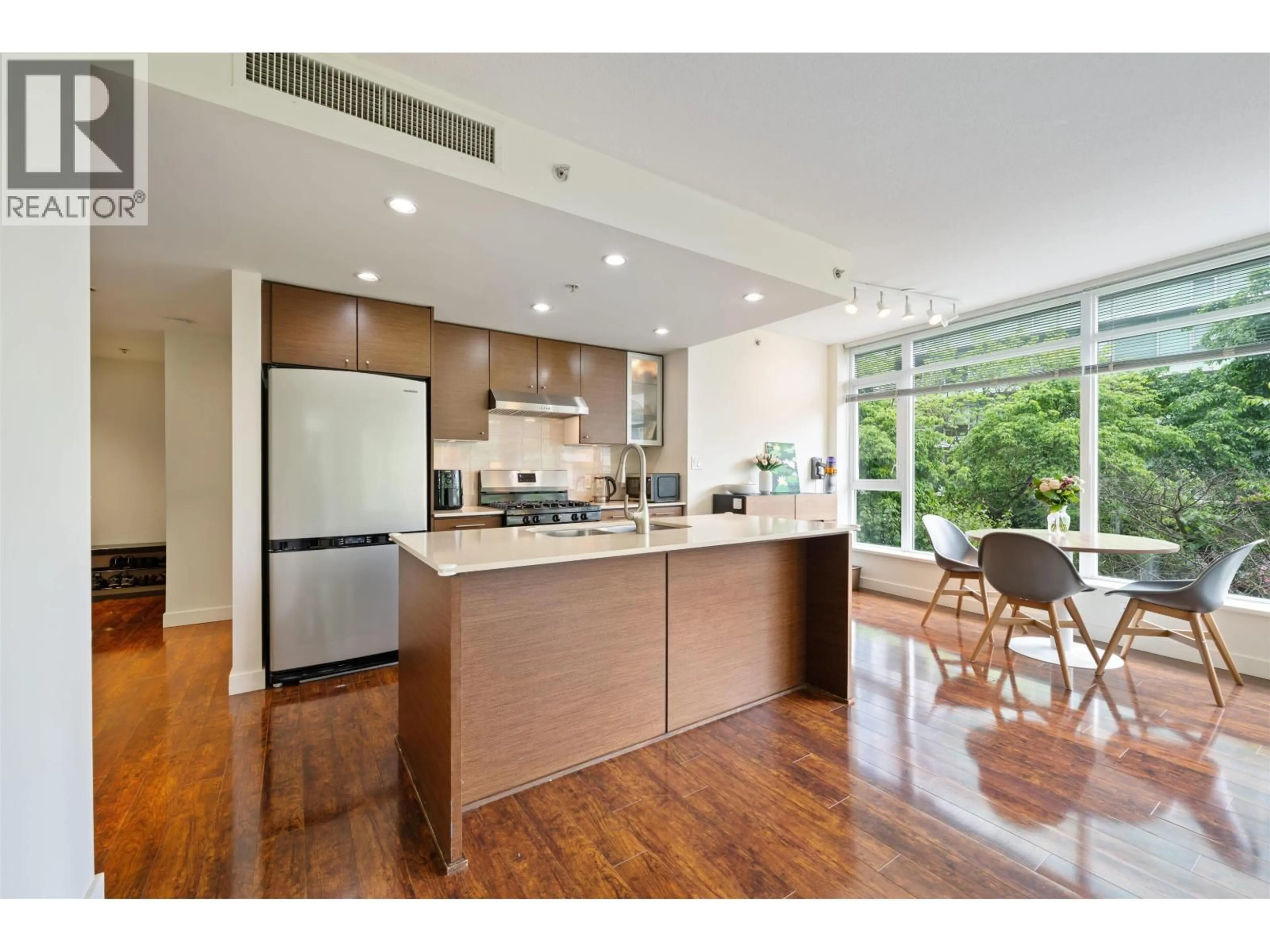 Open concept kitchen, wood/laminate floor for 608 - 5900 ALDERBRIDGE WAY, Richmond British Columbia V6X0B6