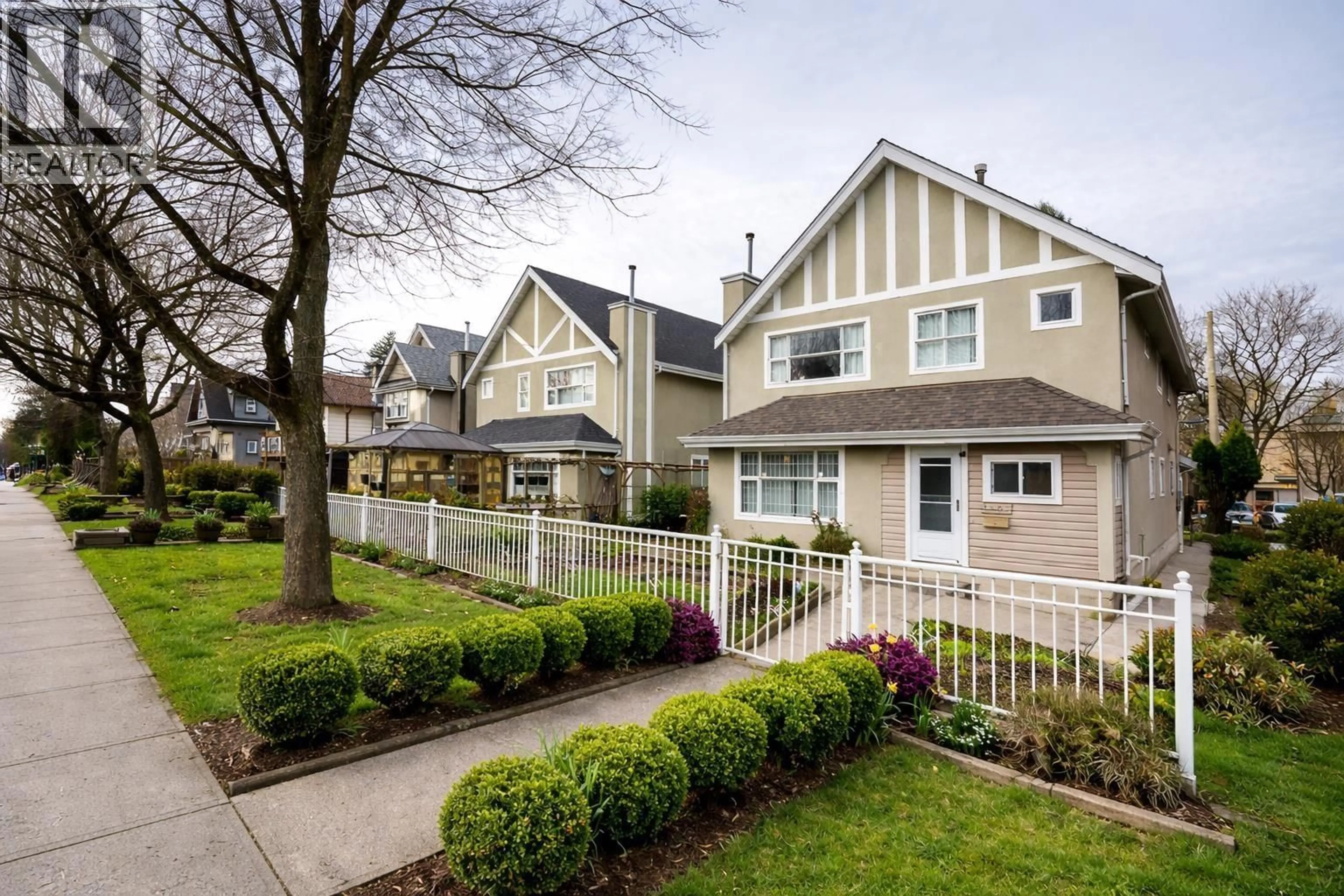 Home with vinyl exterior material, street for 1407 12TH AVENUE, Vancouver British Columbia V5N2A1