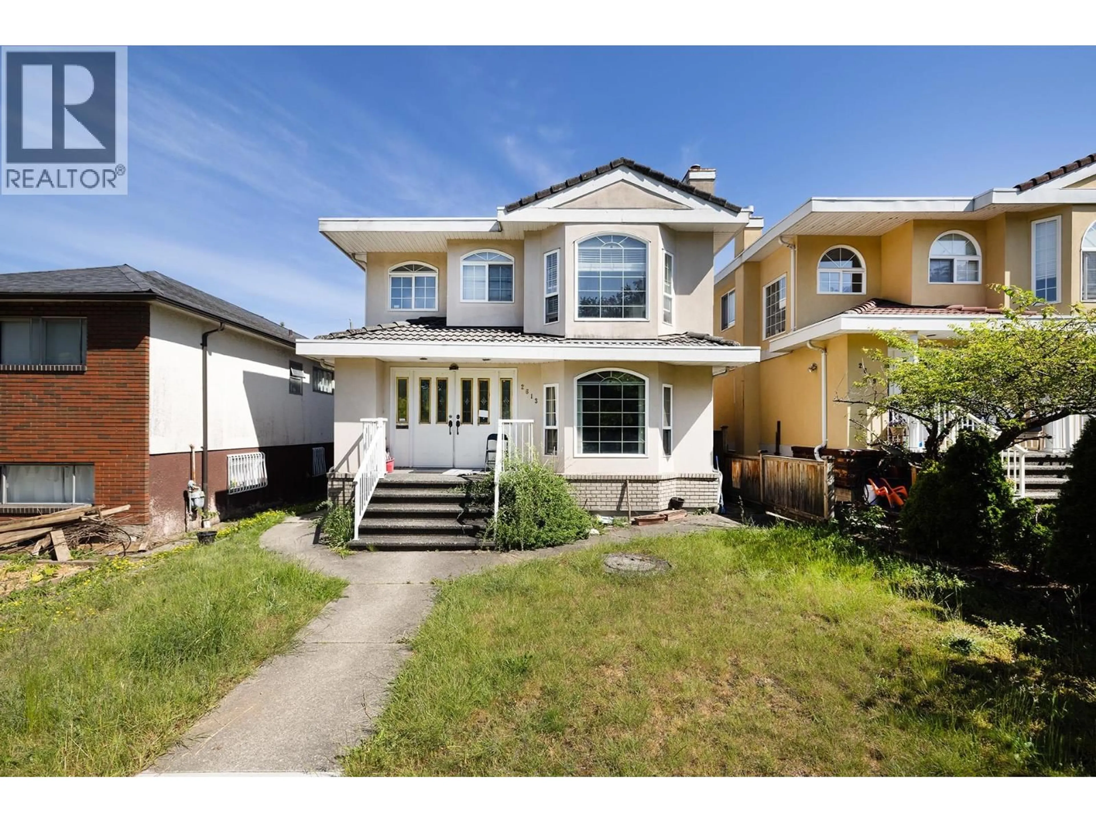 Home with vinyl exterior material, street for 2613 PARKER STREET, Vancouver British Columbia V5K2T5