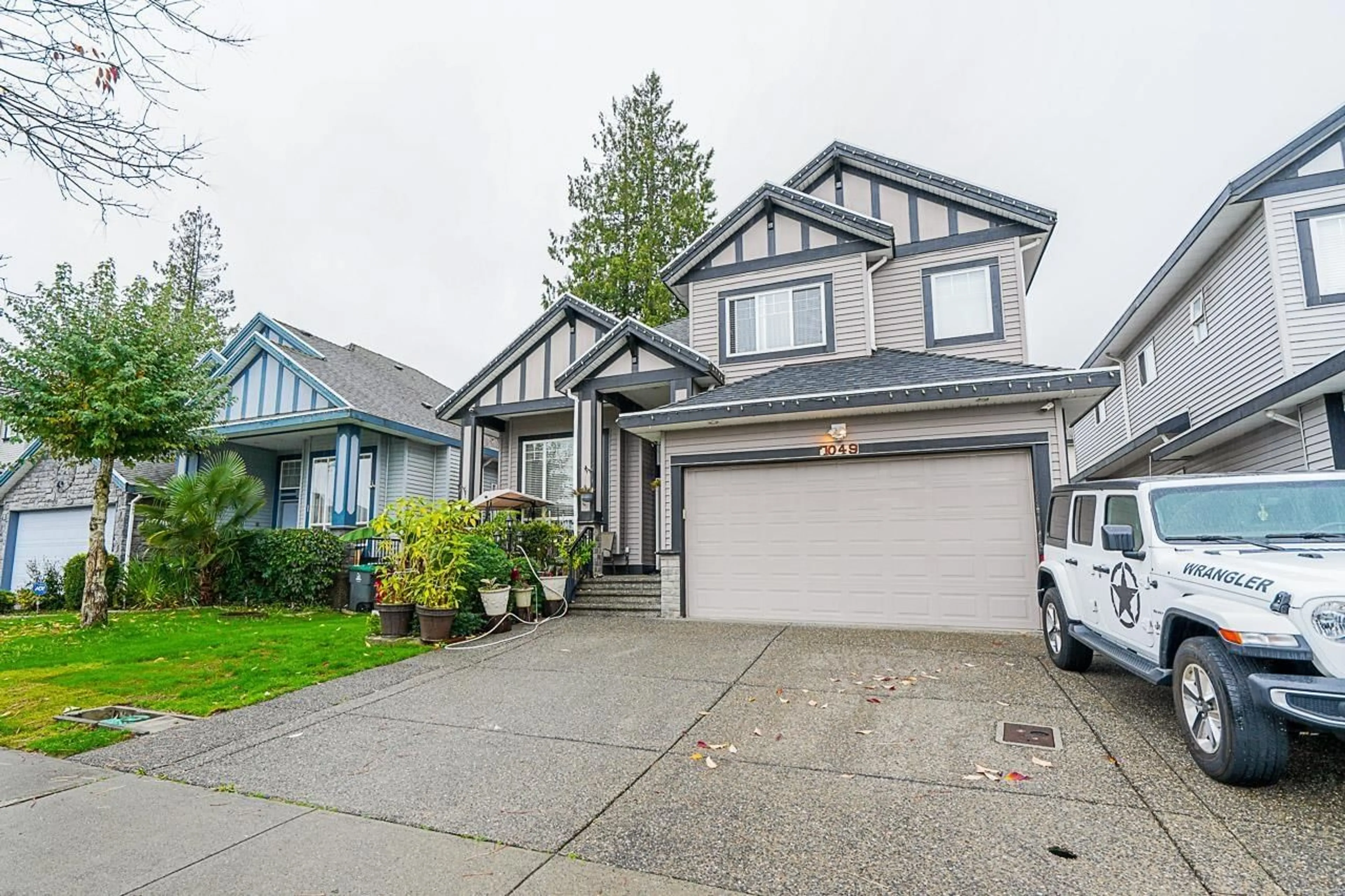 Home with vinyl exterior material, street for 7049 150 STREET, Surrey British Columbia V3S3J3