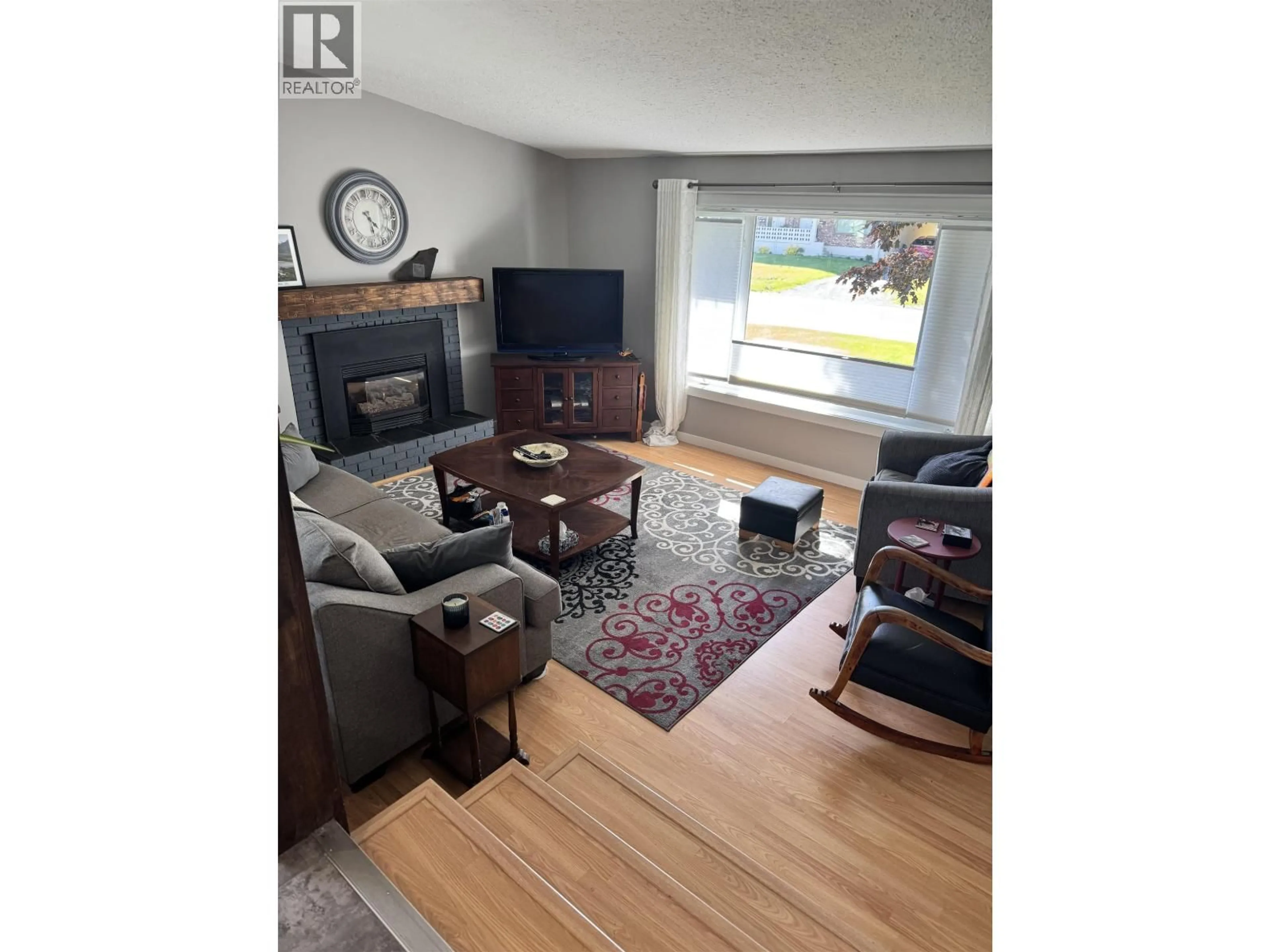 Living room with furniture, wood/laminate floor for 2306 PEAR STREET, Terrace British Columbia V8G2R2