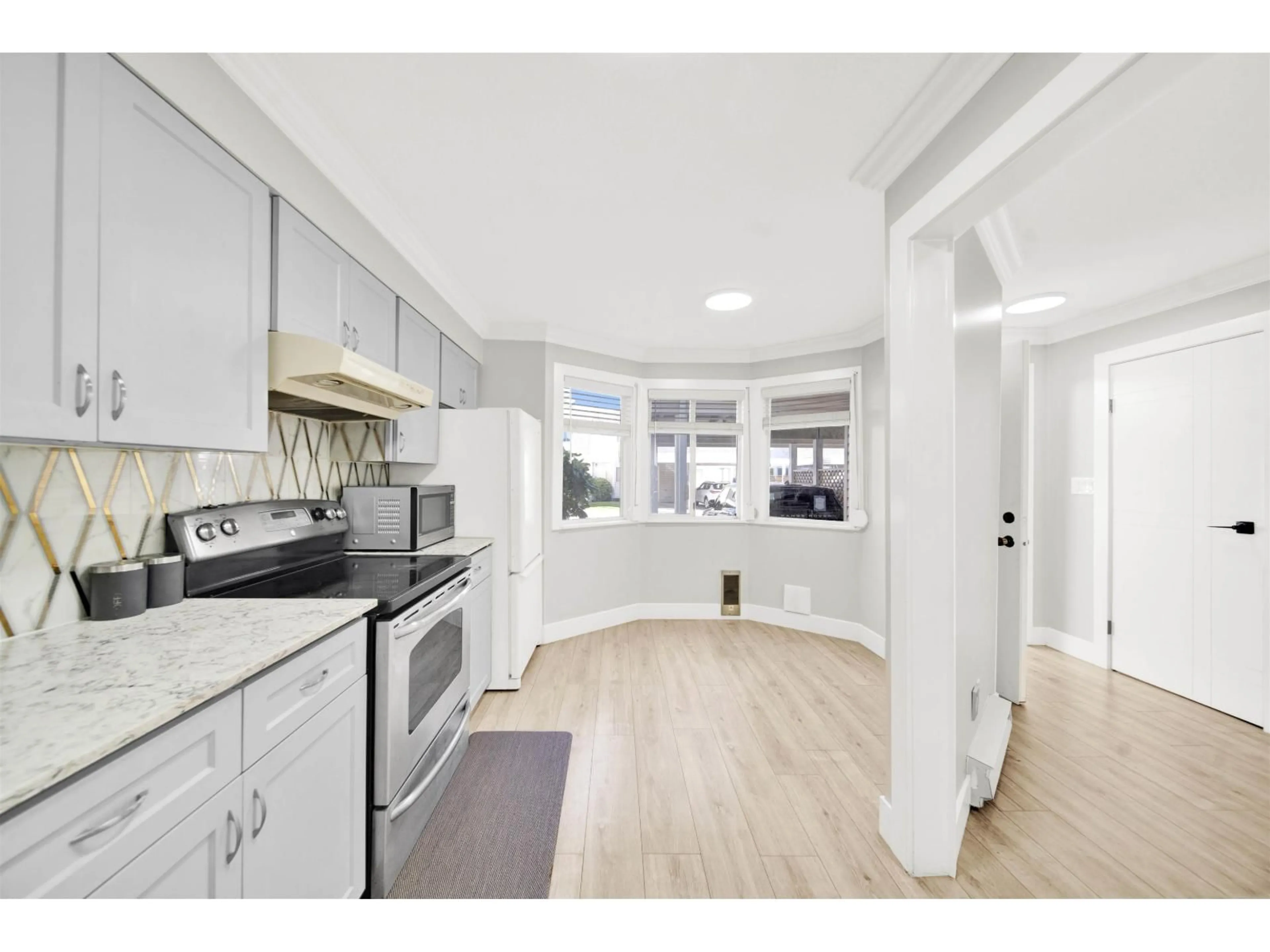 Open concept kitchen, unknown for 2 - 7560 138 STREET, Surrey British Columbia V3W0A9