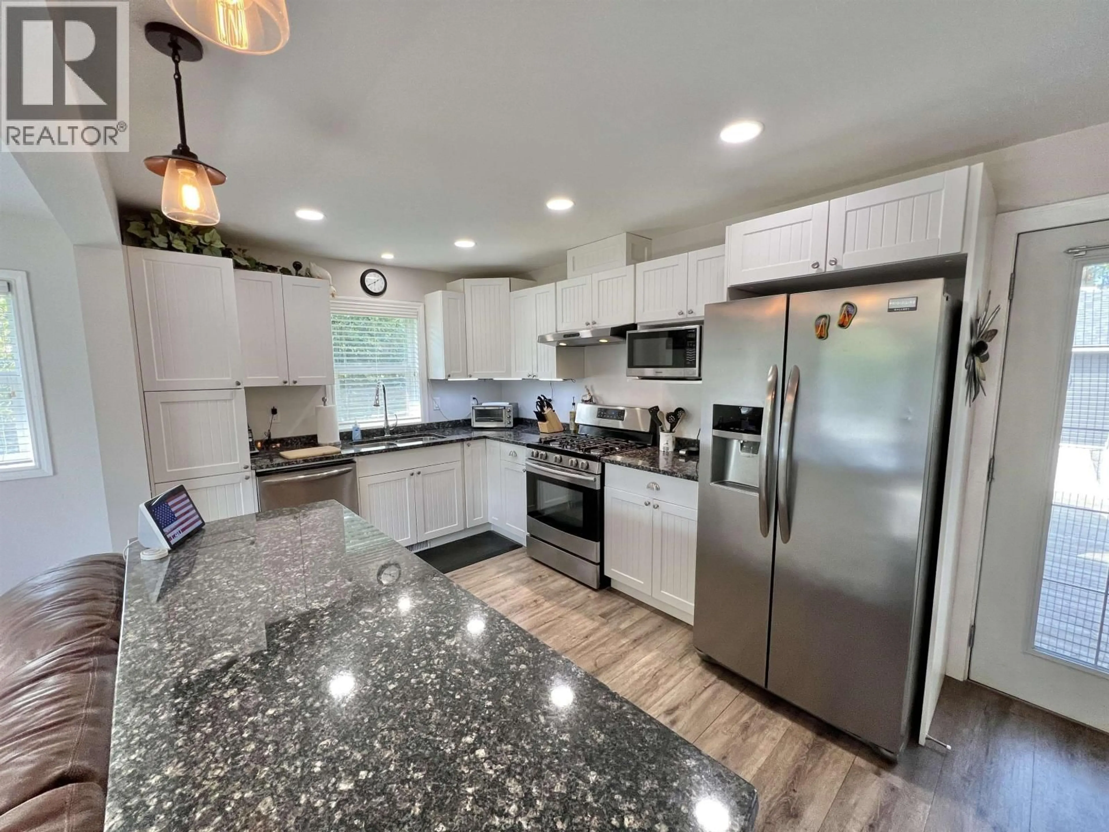 Open concept kitchen, ceramic/tile floor for 913 JOHNSTON AVENUE, Quesnel British Columbia V2J3B9