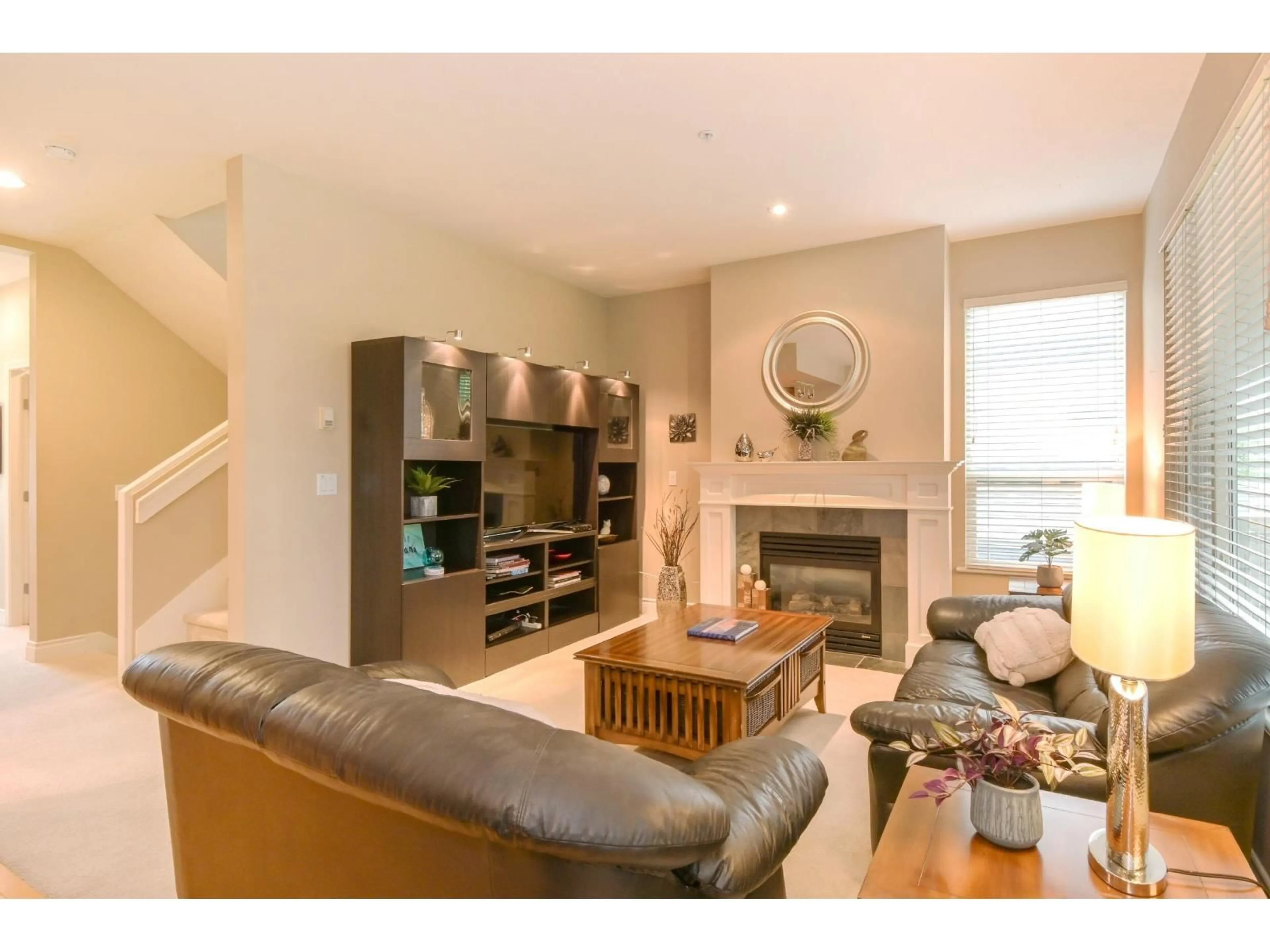 Living room with furniture, wood/laminate floor for 104 - 16655 64 AVENUE, Surrey British Columbia V3S3V1