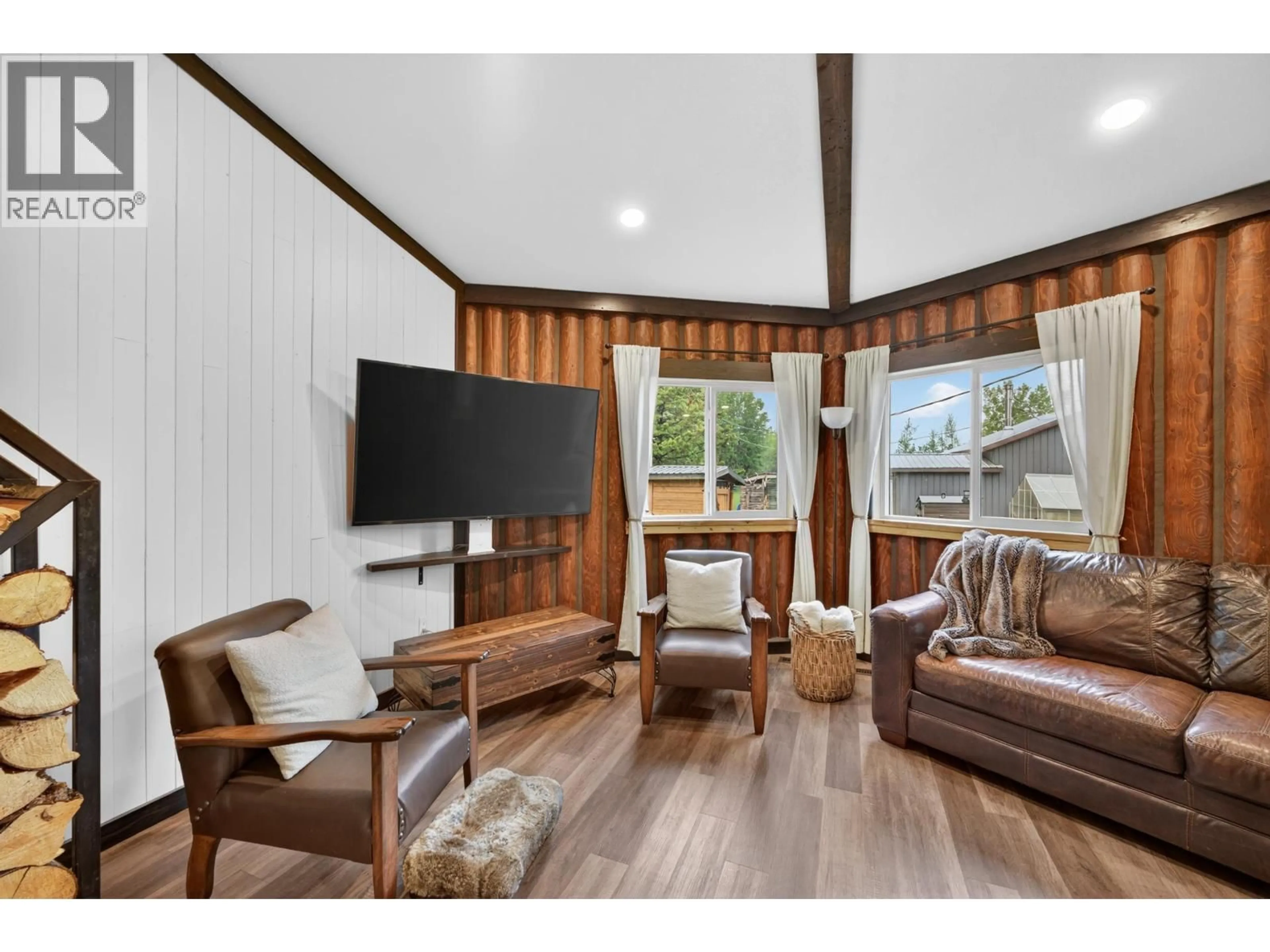 Living room with furniture, wood/laminate floor for 14672 COFFEE CREEK SUBDIVISION, Fort St. John British Columbia V1J8L9