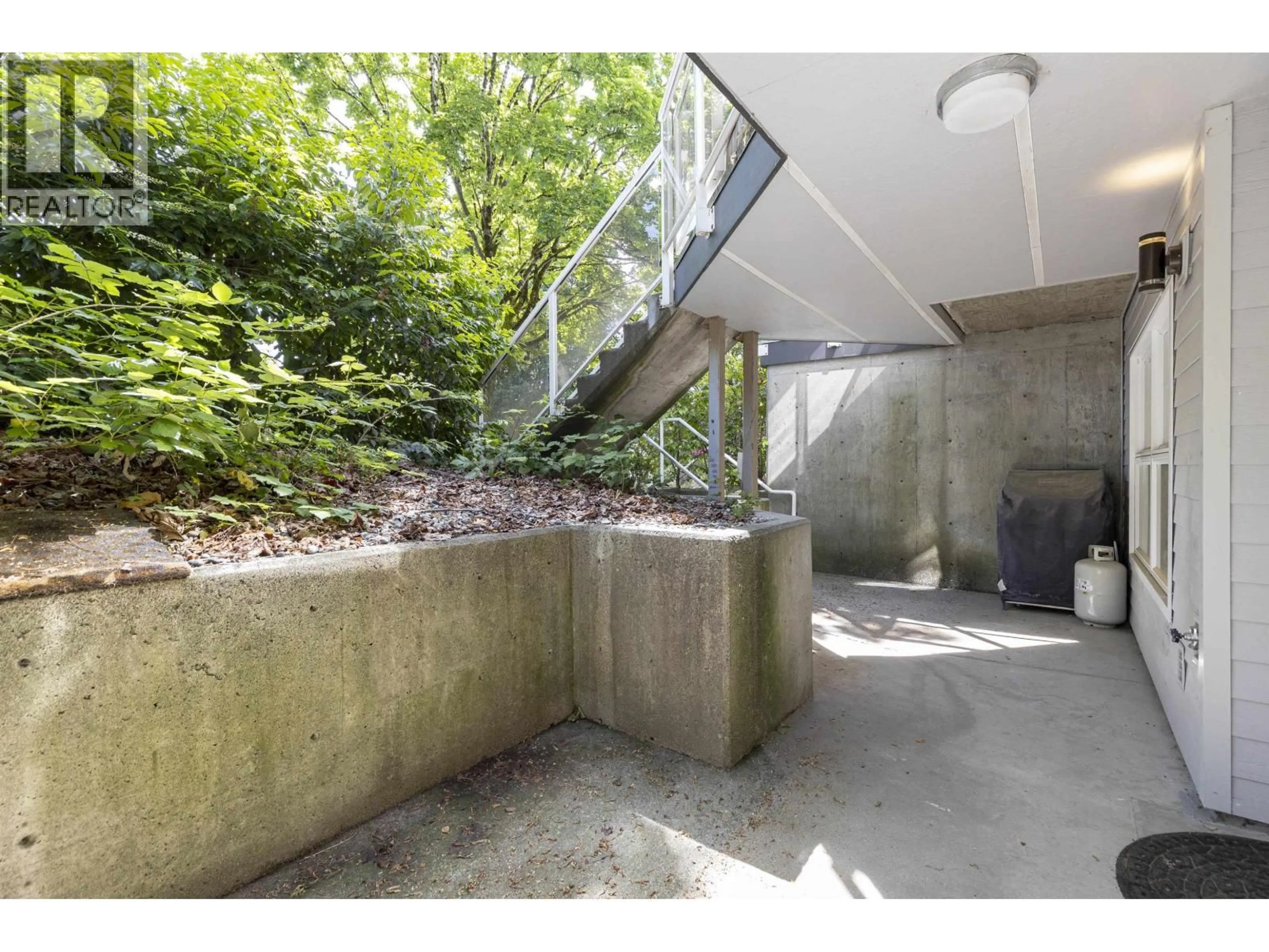 Indoor foyer for 102 - 3787 PENDER STREET, Burnaby British Columbia V5C2L2