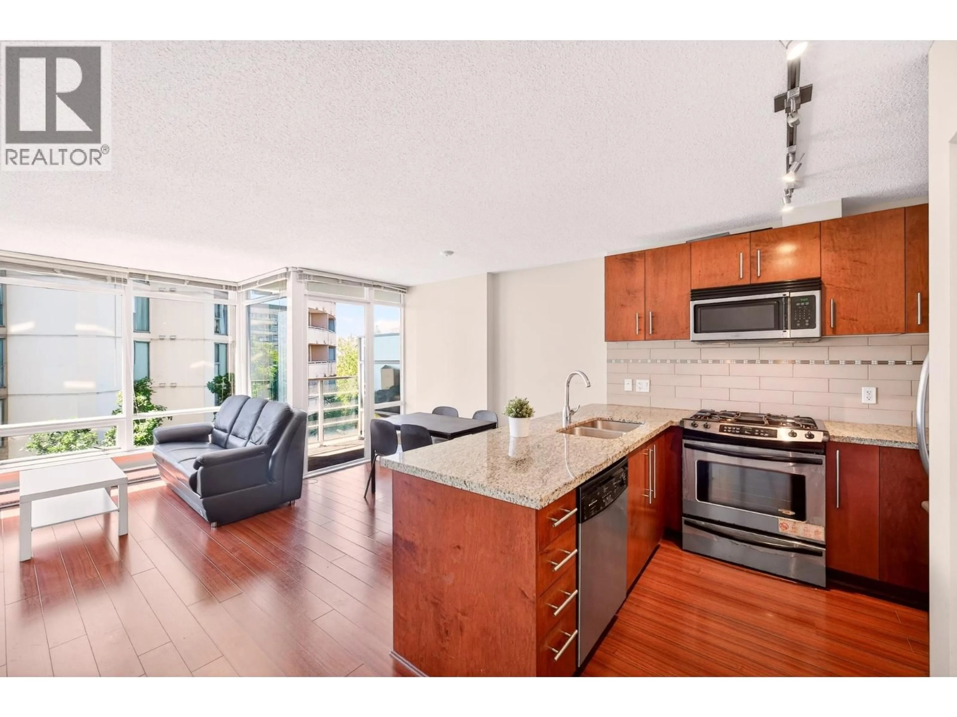 Open concept kitchen, unknown for 606 - 8280 LANSDOWNE ROAD, Richmond British Columbia V6X0B2