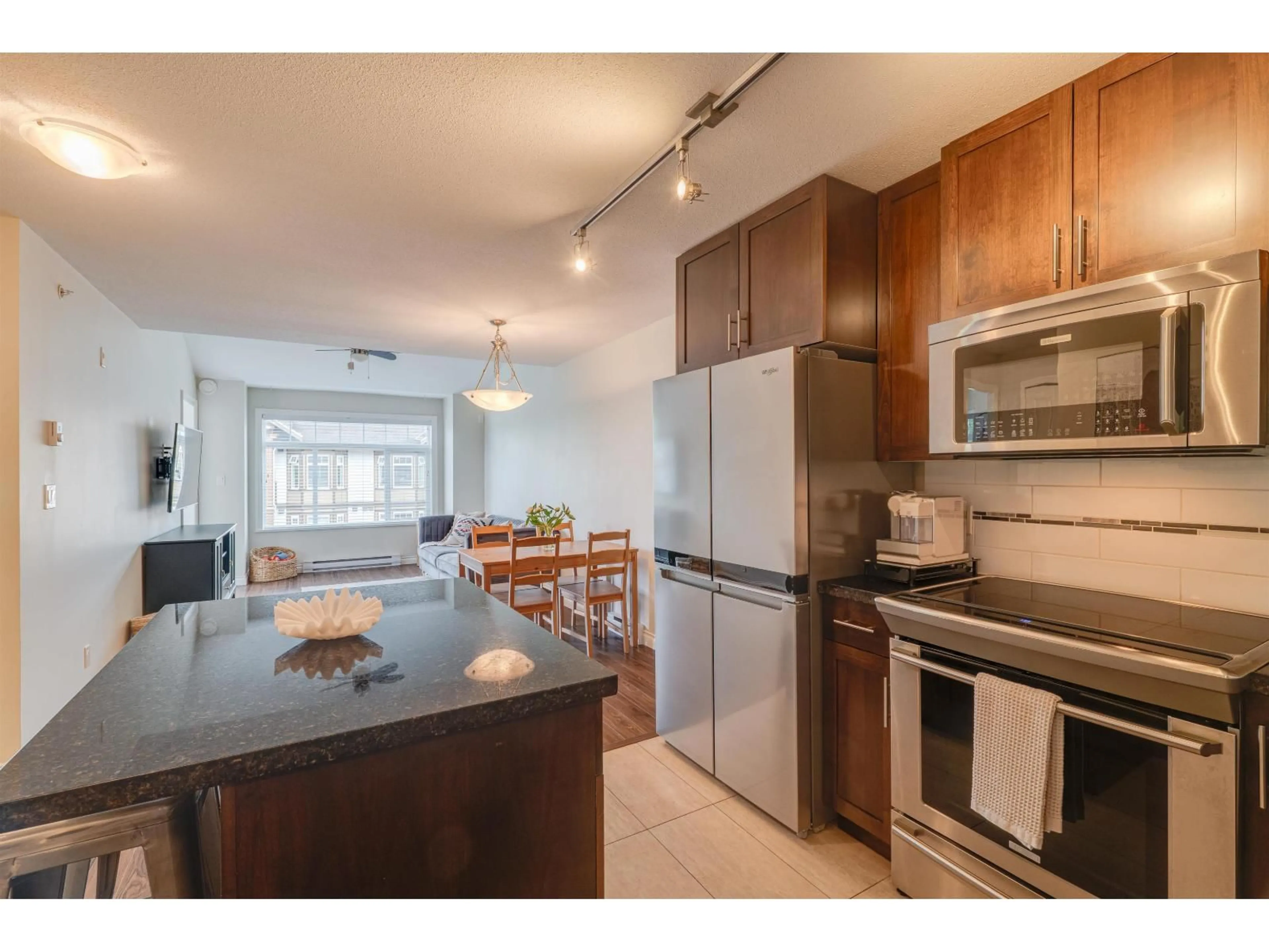 Open concept kitchen, unknown for 423 - 5650 201A STREET, Langley British Columbia V3A0B3