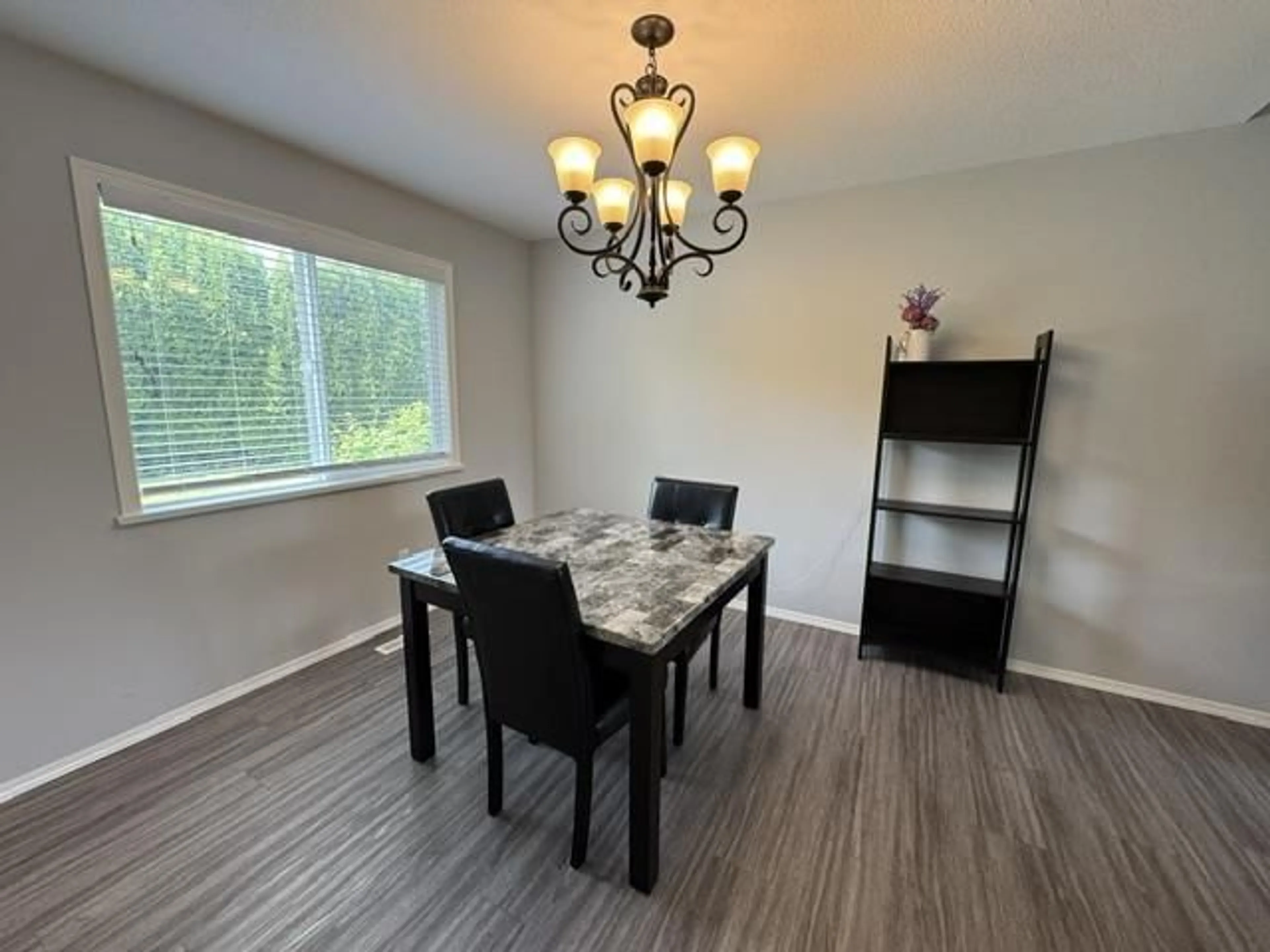 Dining room, wood/laminate floor for 7665 SAPPHIRE DRIVE, Chilliwack British Columbia V2R3A7