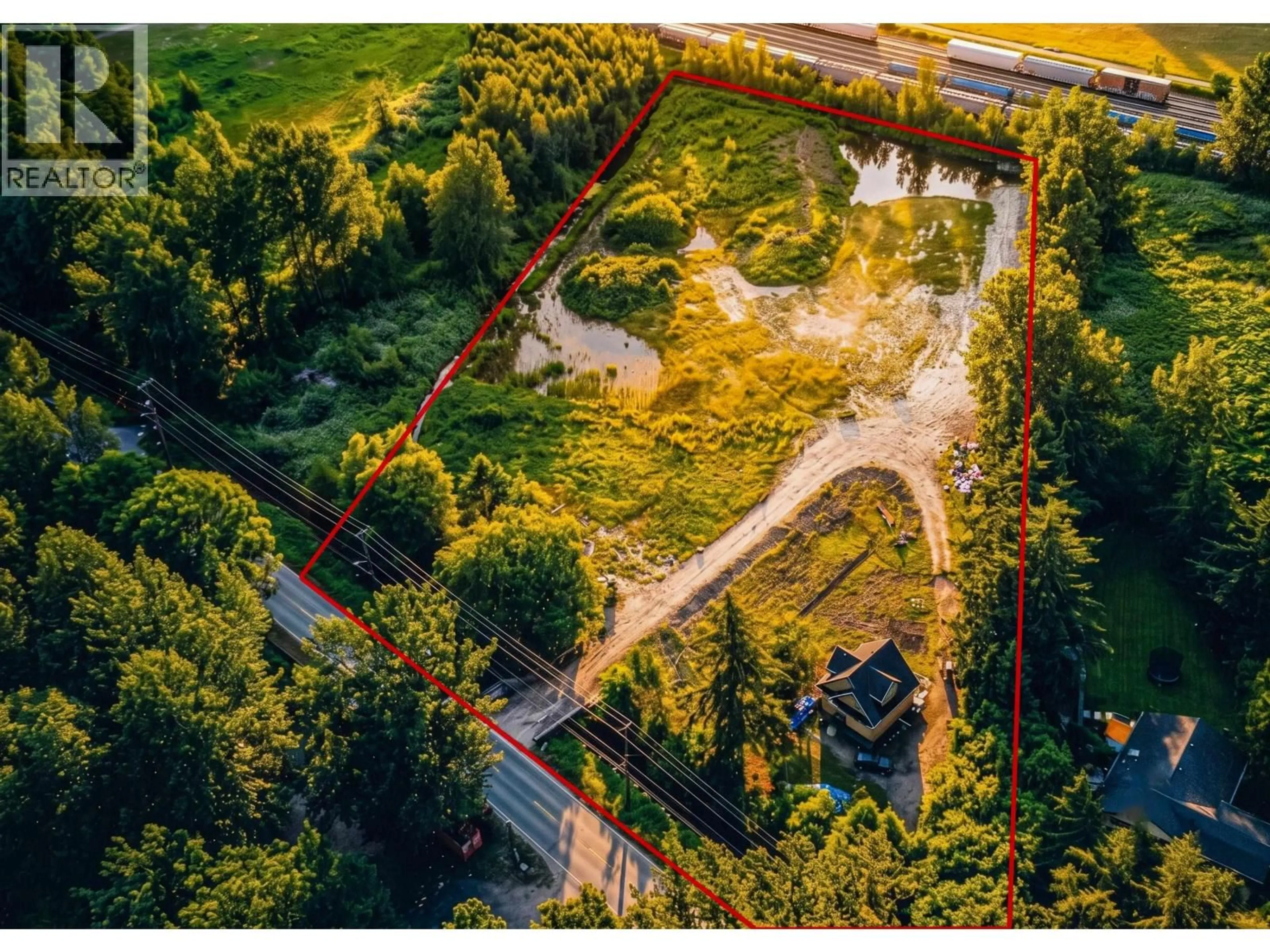 A pic from outside/outdoor area/front of a property/back of a property/a pic from drone, forest/trees view for 17260 RIVER ROAD, Richmond British Columbia V6V1L9