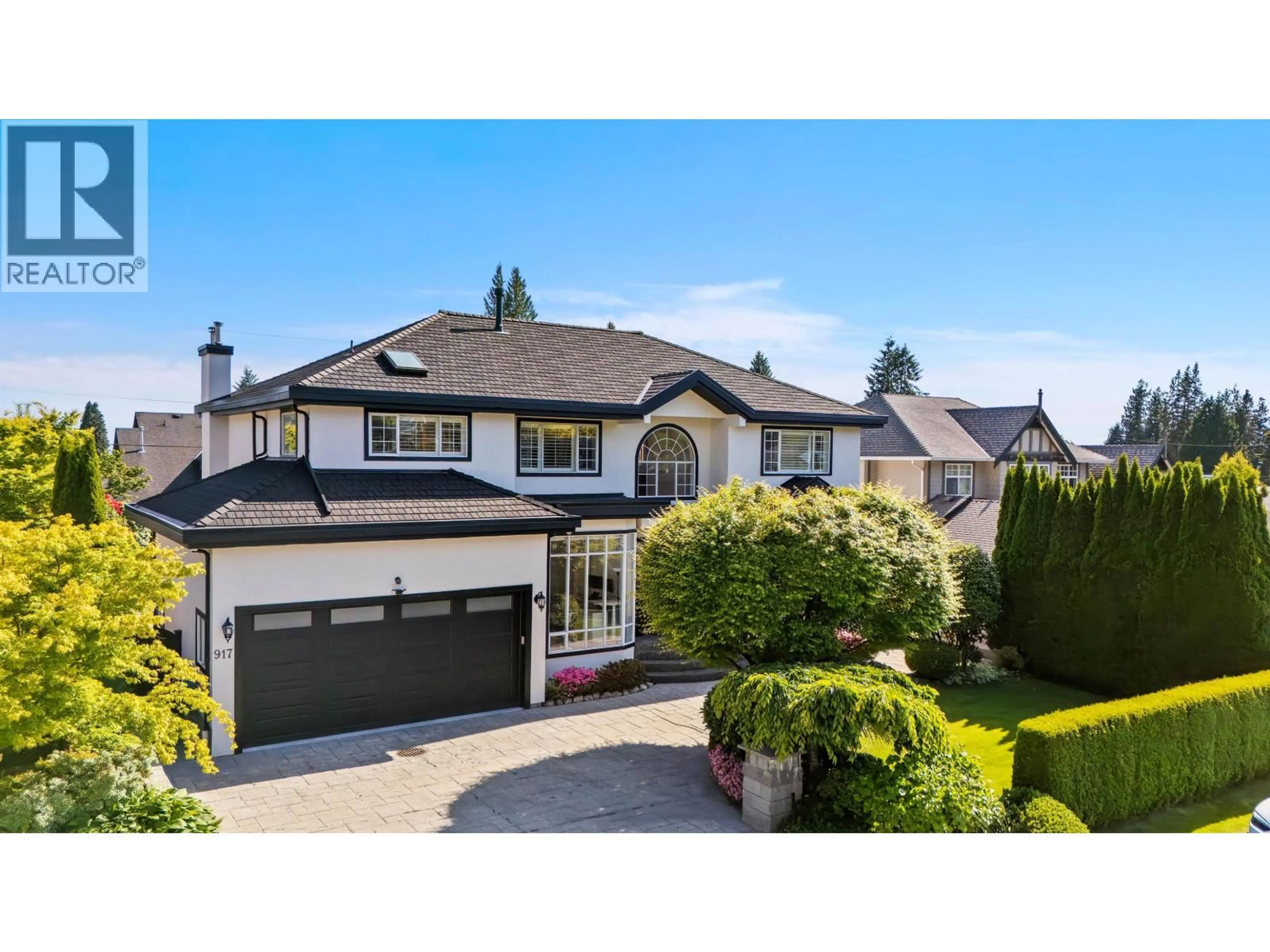 Home with vinyl exterior material, street for 917 WAVERTREE ROAD, North Vancouver British Columbia V7R1S4