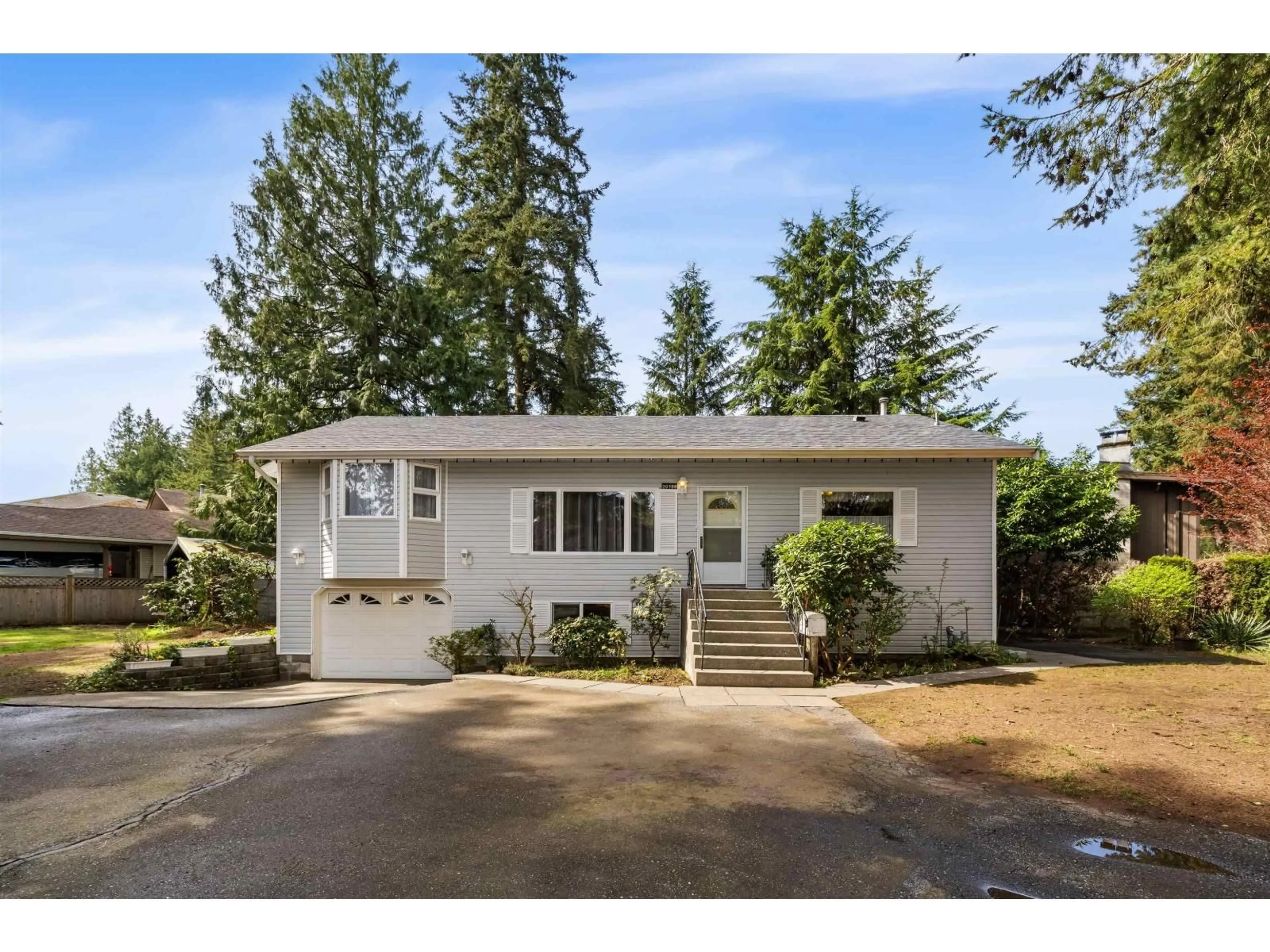 Home with vinyl exterior material, street for 20188 40 AVENUE, Langley British Columbia V3A2W5