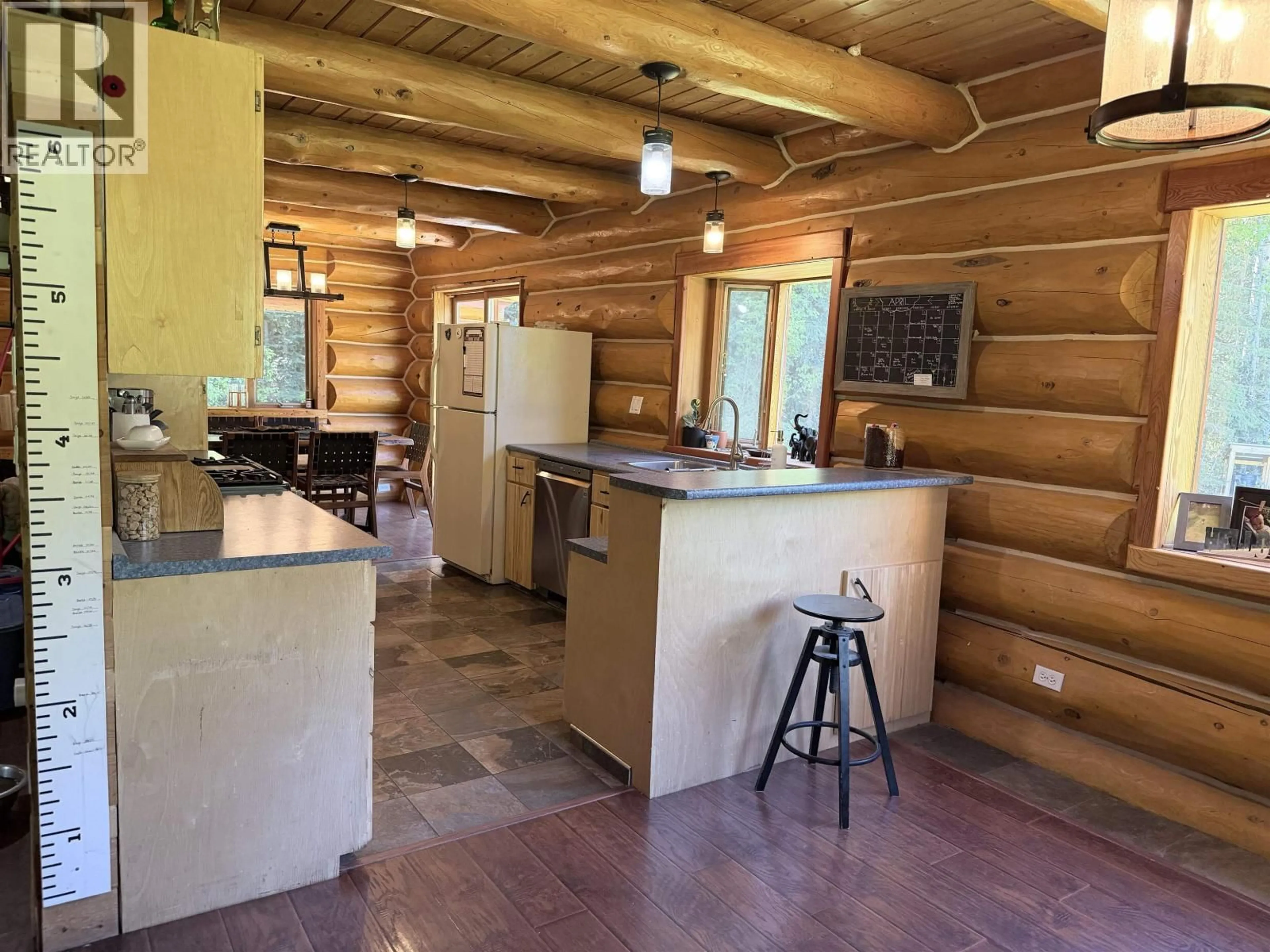 Rustic kitchen, wood/laminate floor for 2827 WOODRIDGE ROAD, Fort St. James British Columbia V0J1P0