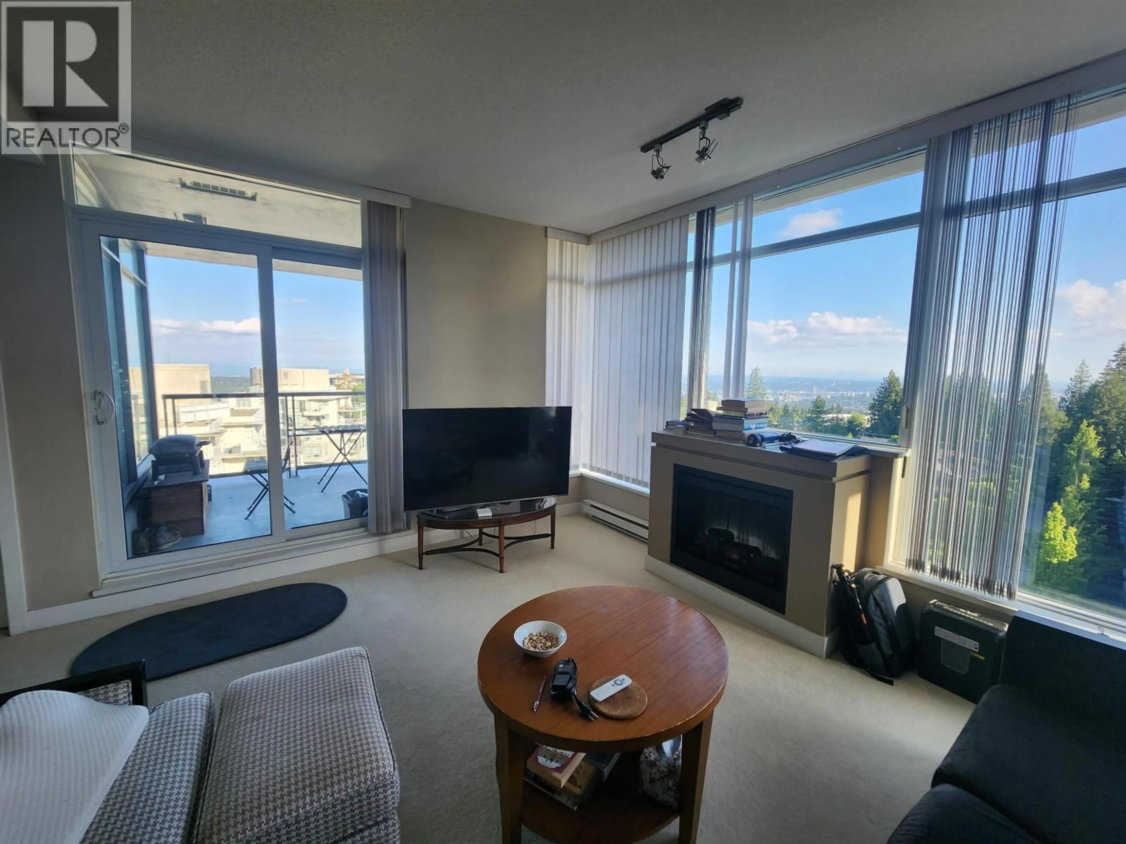 Living room with furniture, unknown for 1106 - 9222 UNIVERSITY CRESCENT, Burnaby British Columbia V5A0A6