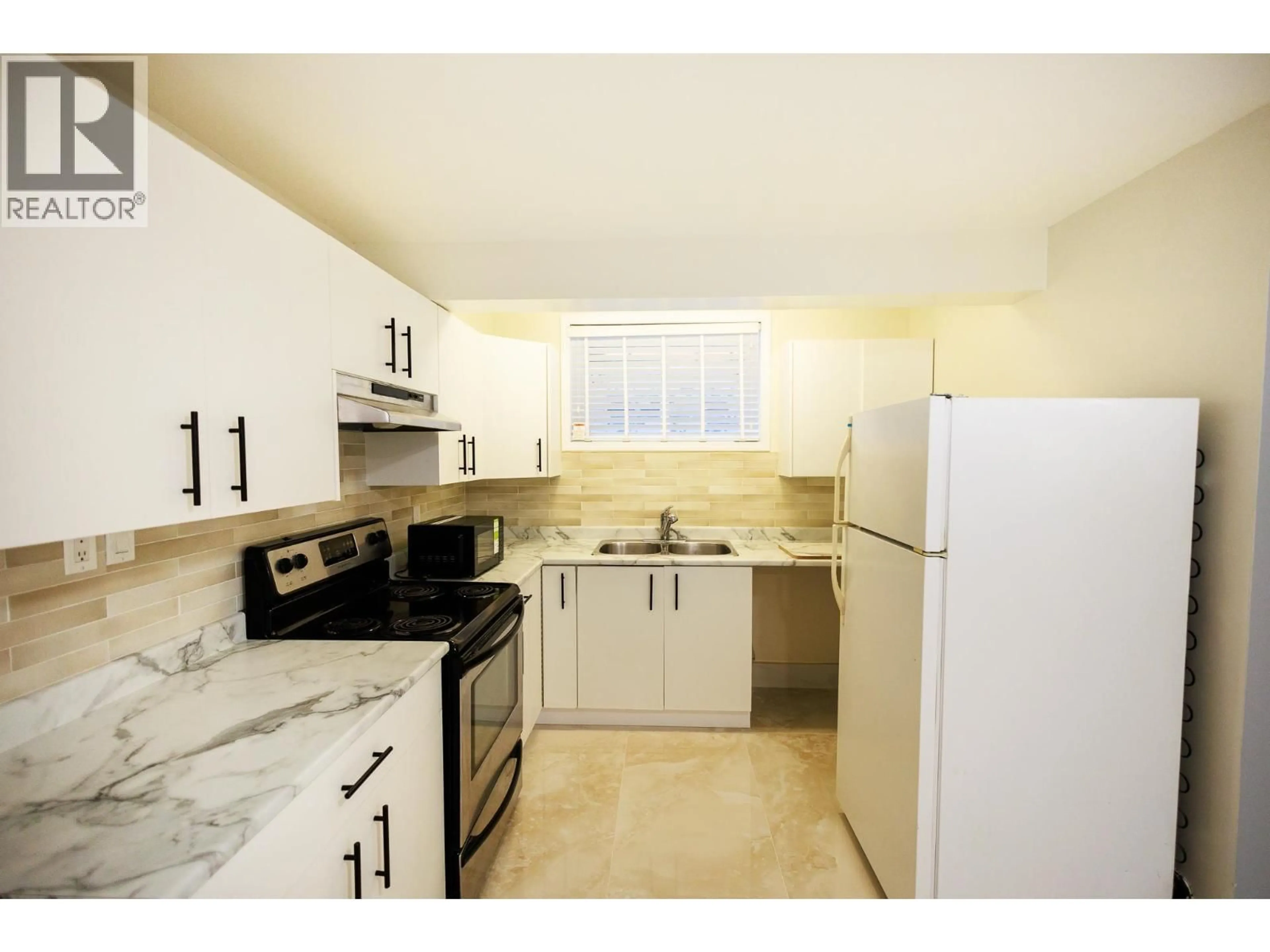 Standard kitchen, ceramic/tile floor for 5418 MCCONNELL CRESCENT, Terrace British Columbia V8G0C5