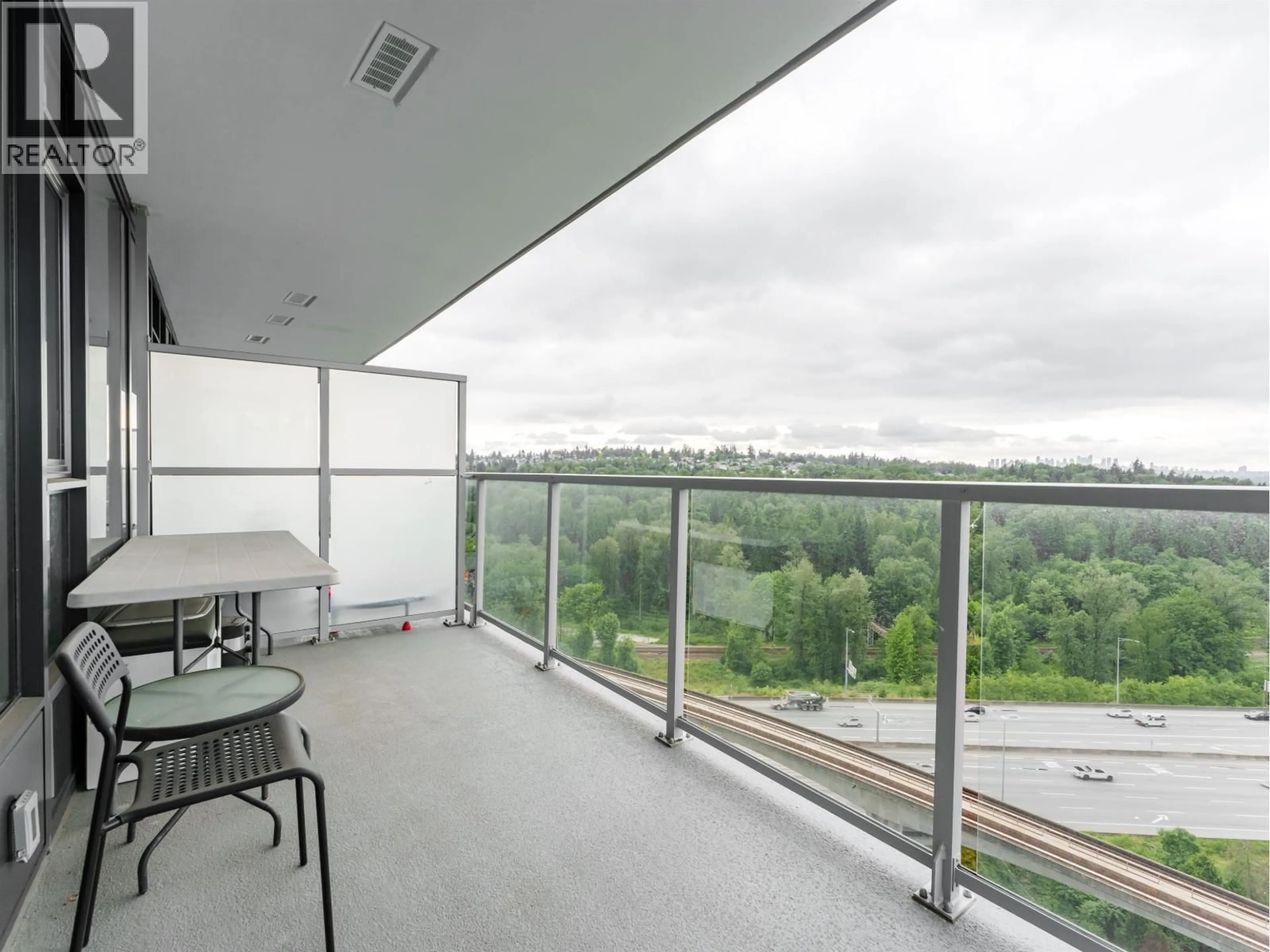 Balcony in the apartment, city buildings view from balcony for 1809 - 318 ALDERSON AVENUE, Coquitlam British Columbia V3K0J1