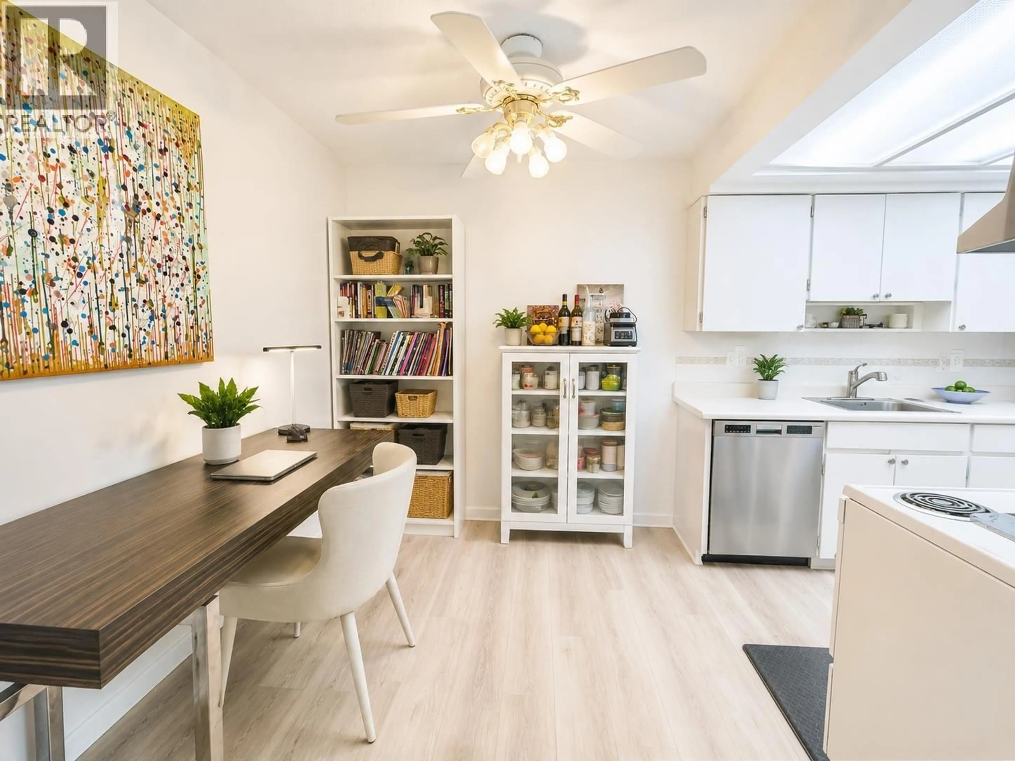 Open concept kitchen, wood/laminate floor for 106 - 6669 TELFORD AVENUE, Burnaby British Columbia V5H4A1