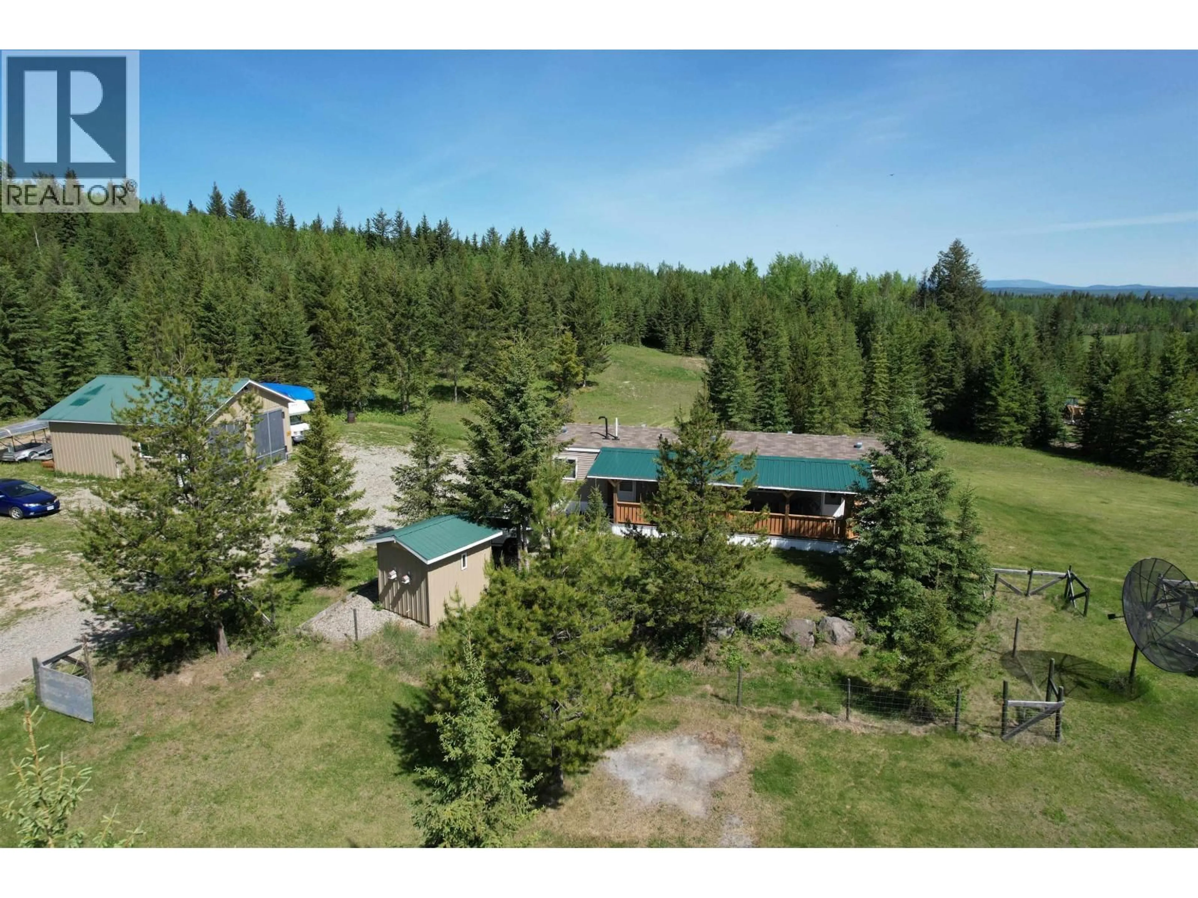 A pic from outside/outdoor area/front of a property/back of a property/a pic from drone, forest/trees view for 2305 MURRAY ROAD, Quesnel British Columbia V2J0A2