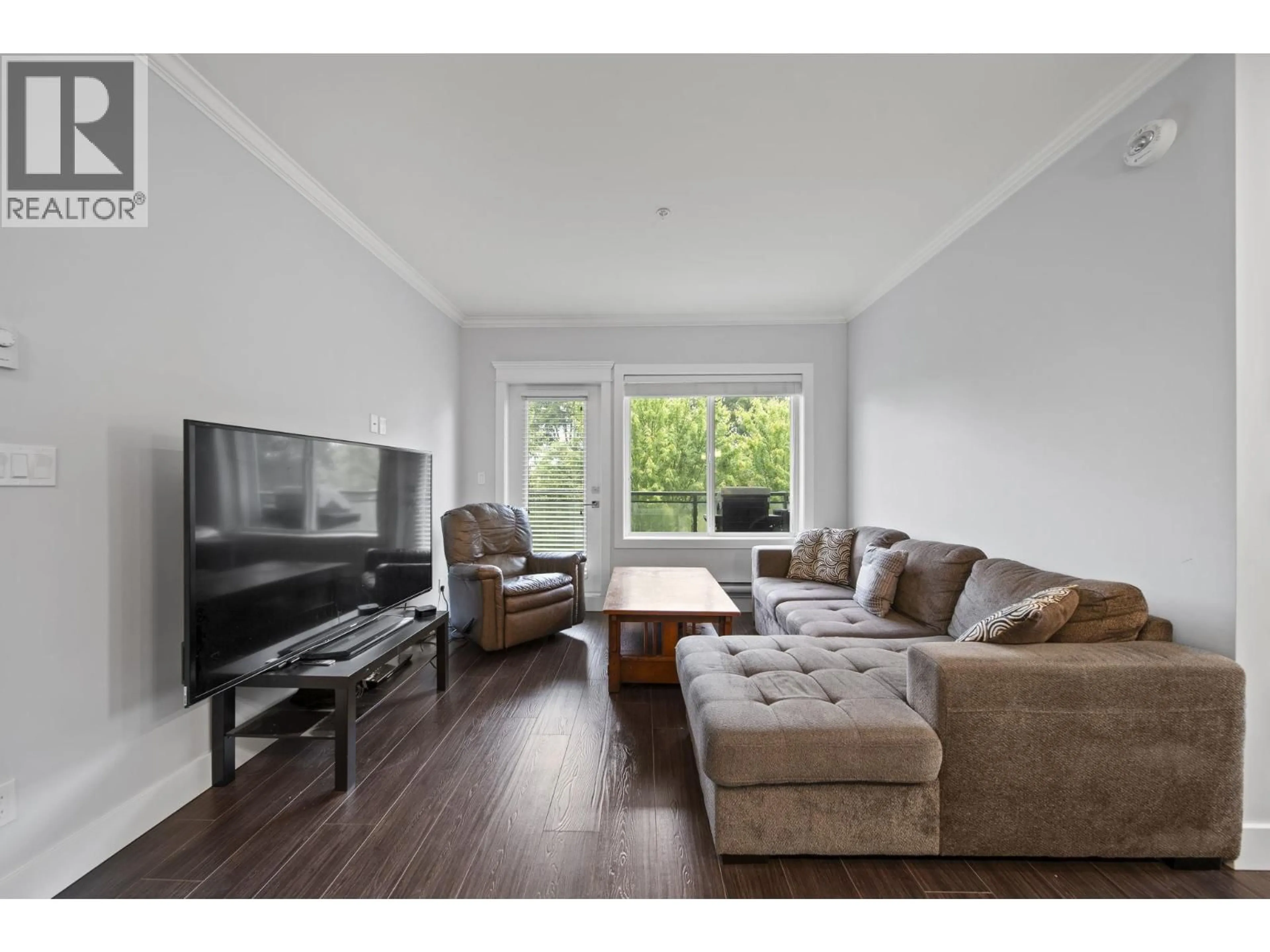 Living room with furniture, wood/laminate floor for 306 - 2229 ATKINS AVENUE, Port Coquitlam British Columbia V3C0H2