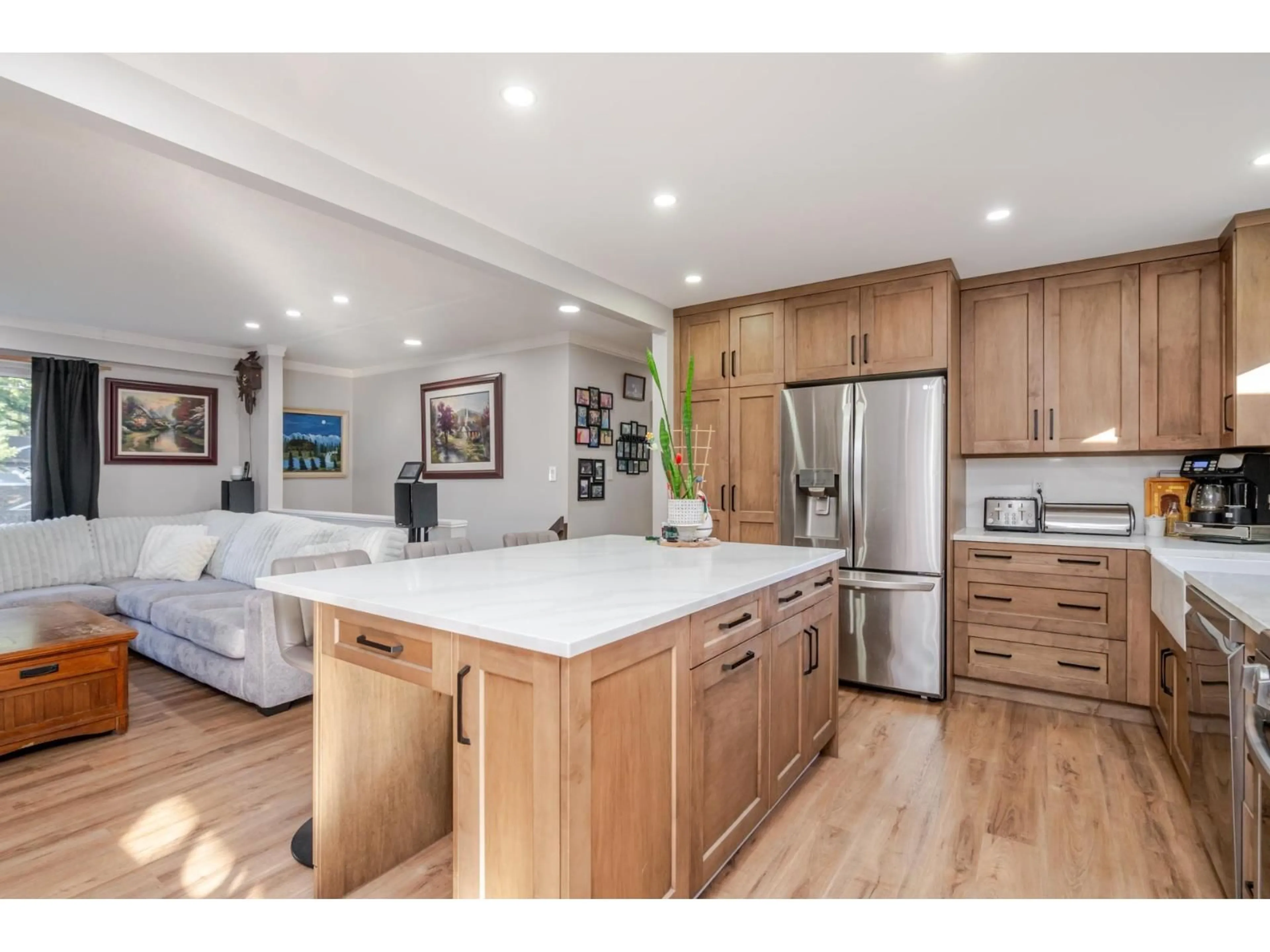 Open concept kitchen, wood/laminate floor for 3924 205B STREET, Langley British Columbia V3A2B3