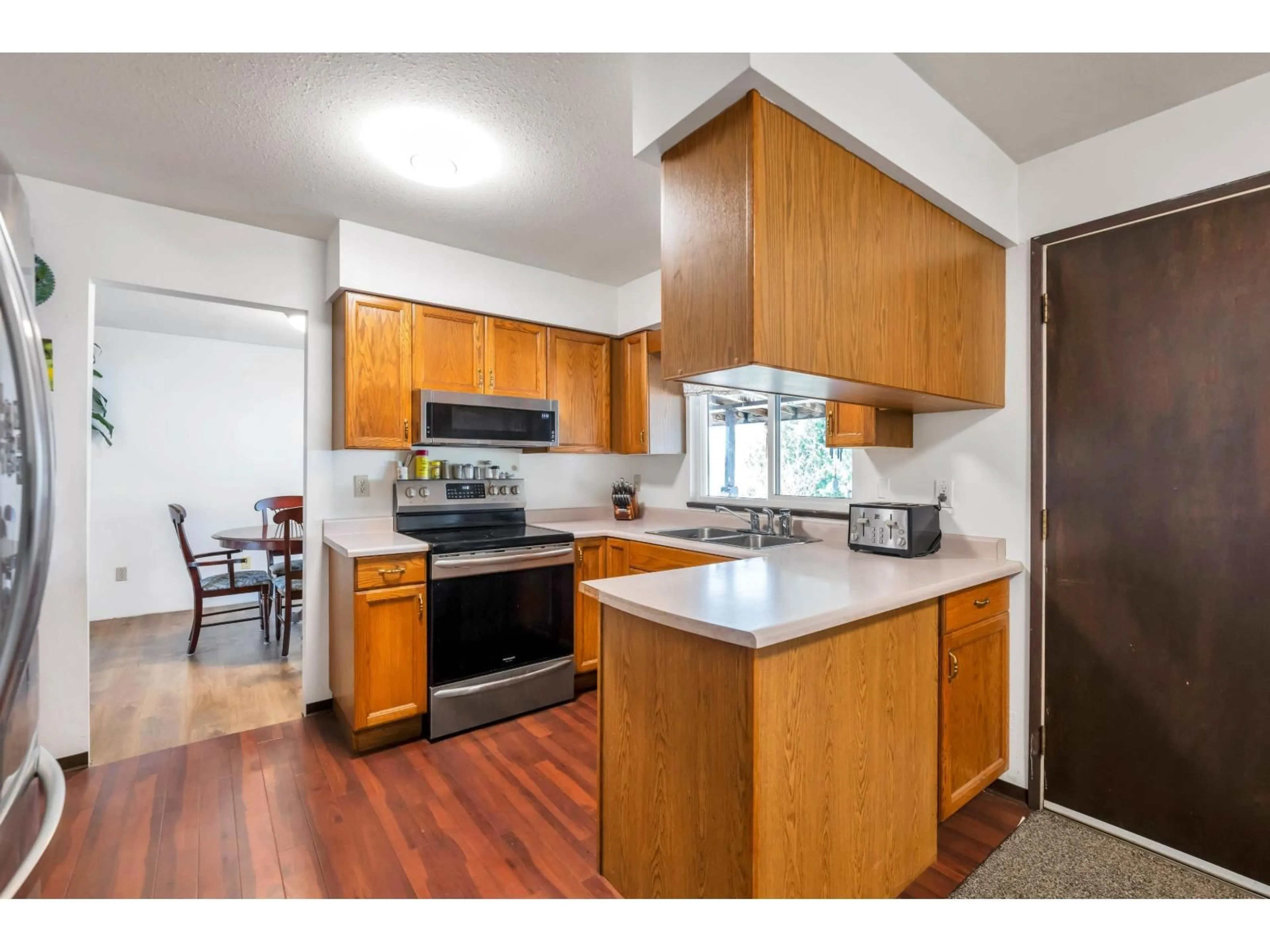 Standard kitchen, wood/laminate floor for 5927 184 STREET, Surrey British Columbia V3S4N2