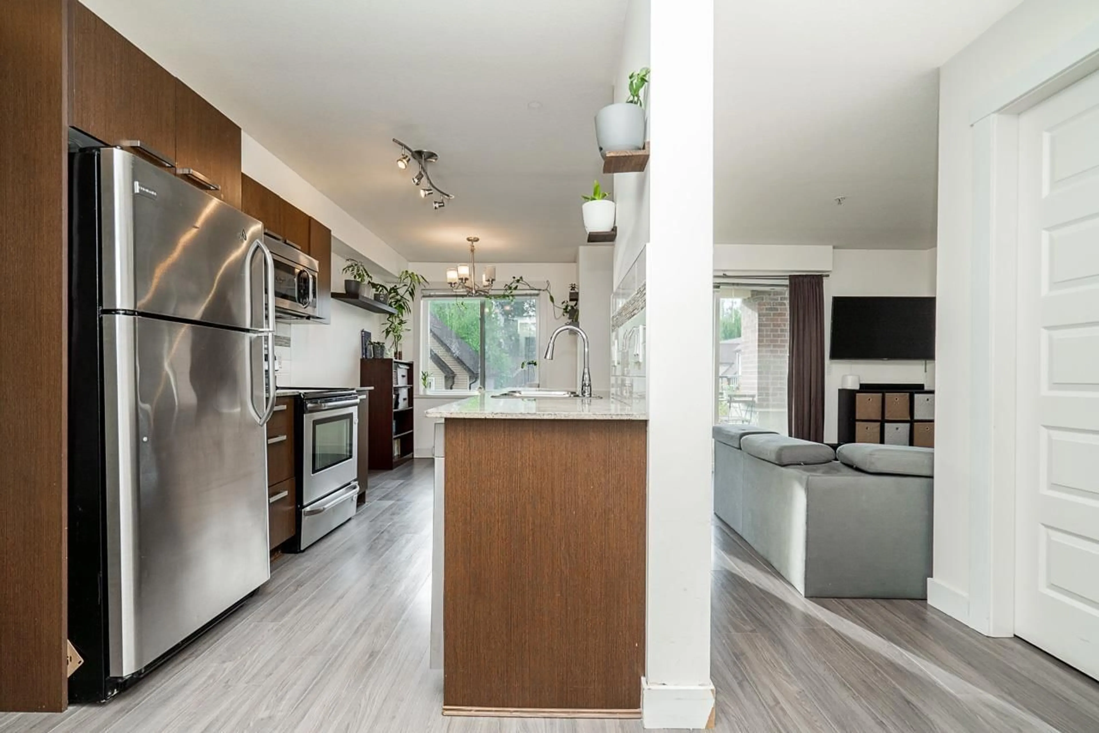 Open concept kitchen, unknown for 313 - 13883 LAUREL DRIVE, Surrey British Columbia V3T1A8