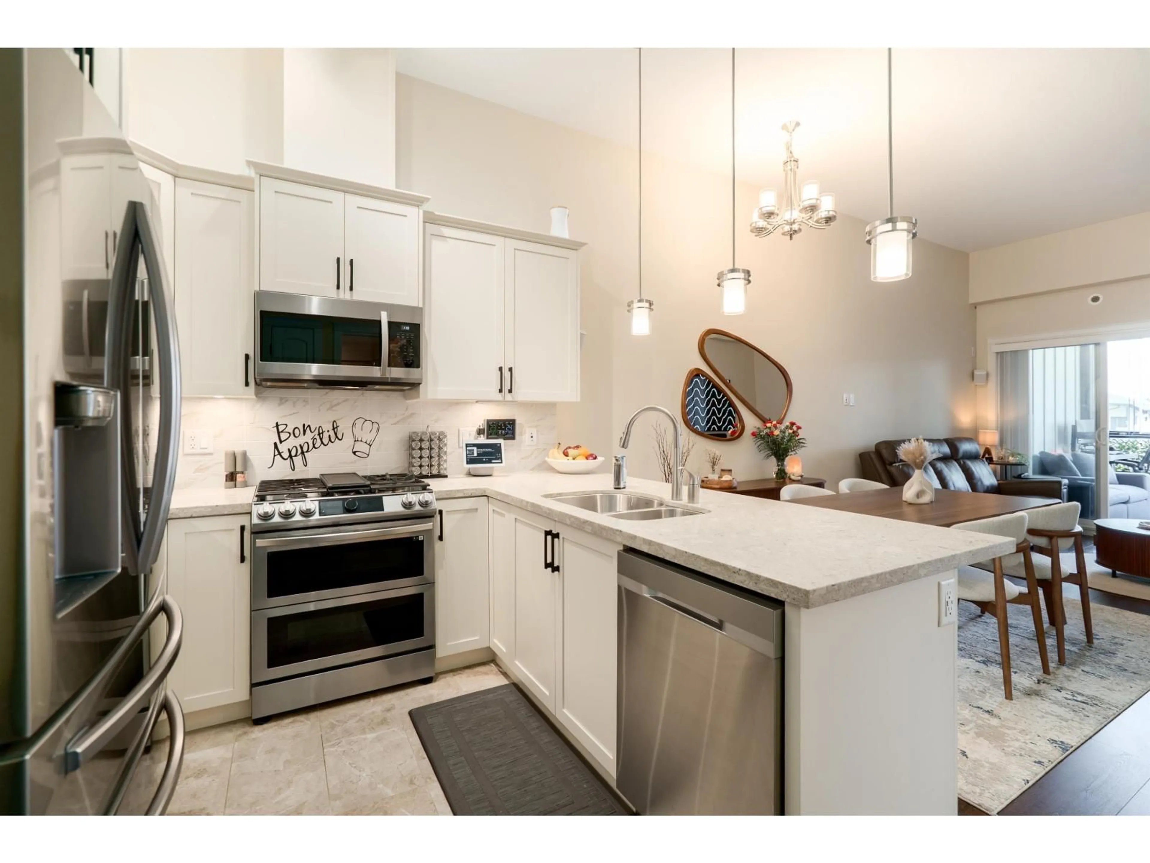 Open concept kitchen, ceramic/tile floor for 601 - 8538 203A STREET, Langley British Columbia V2Y3P9