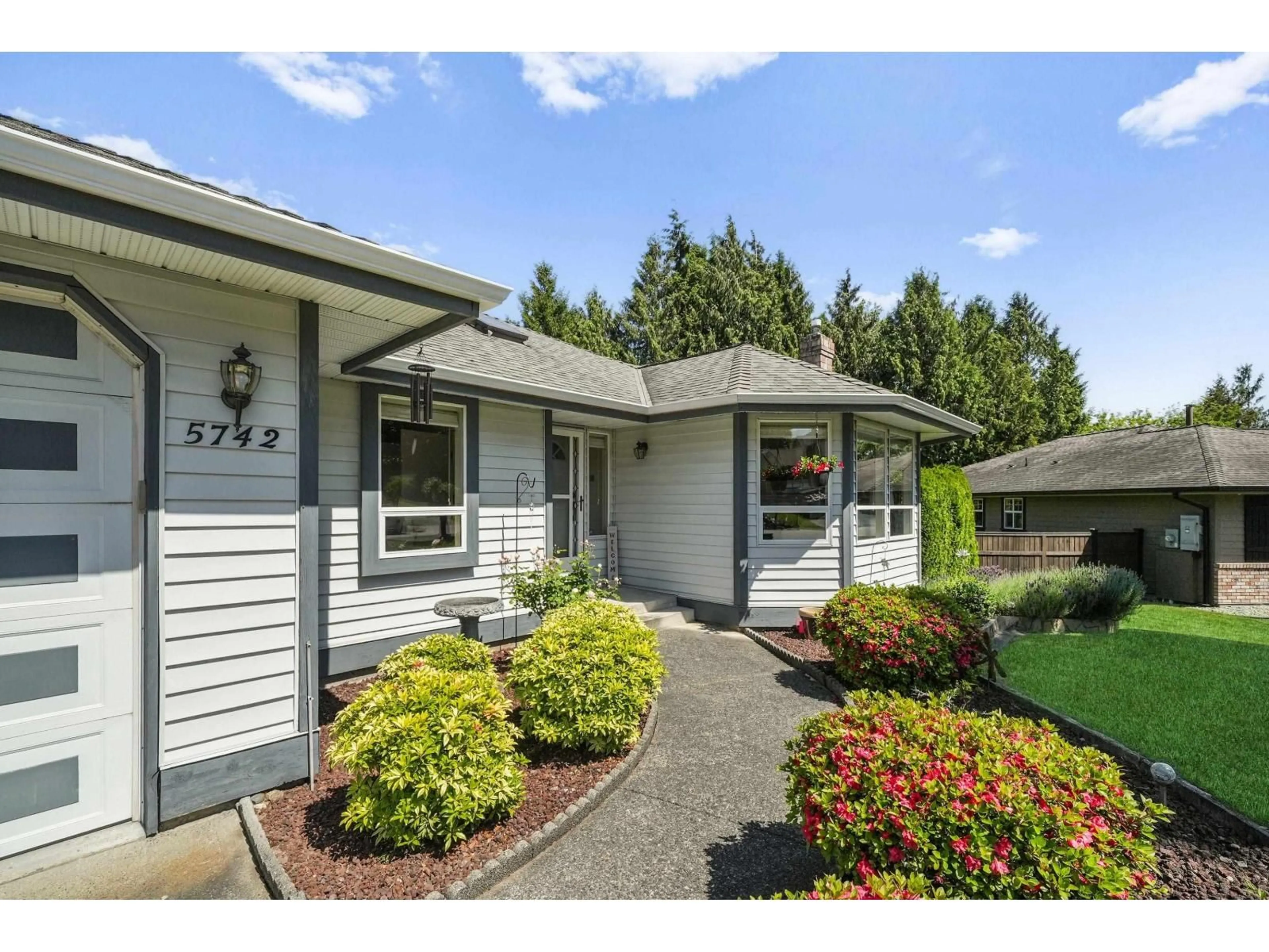 Home with vinyl exterior material, street for 5742 190 STREET, Surrey British Columbia V3S7M5