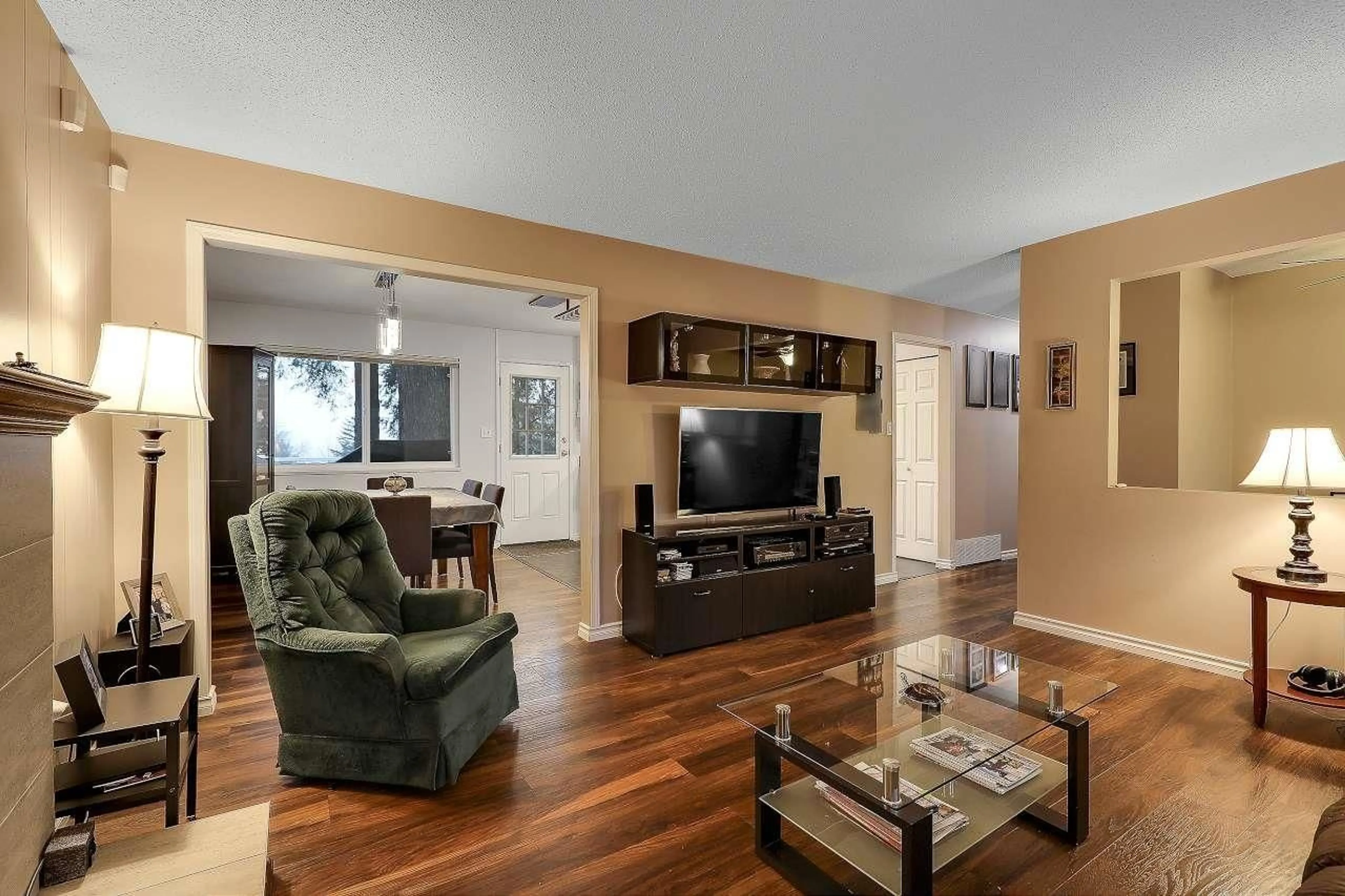 Living room with furniture, wood/laminate floor for 14415 114 AVENUE, Surrey British Columbia V3R2M7