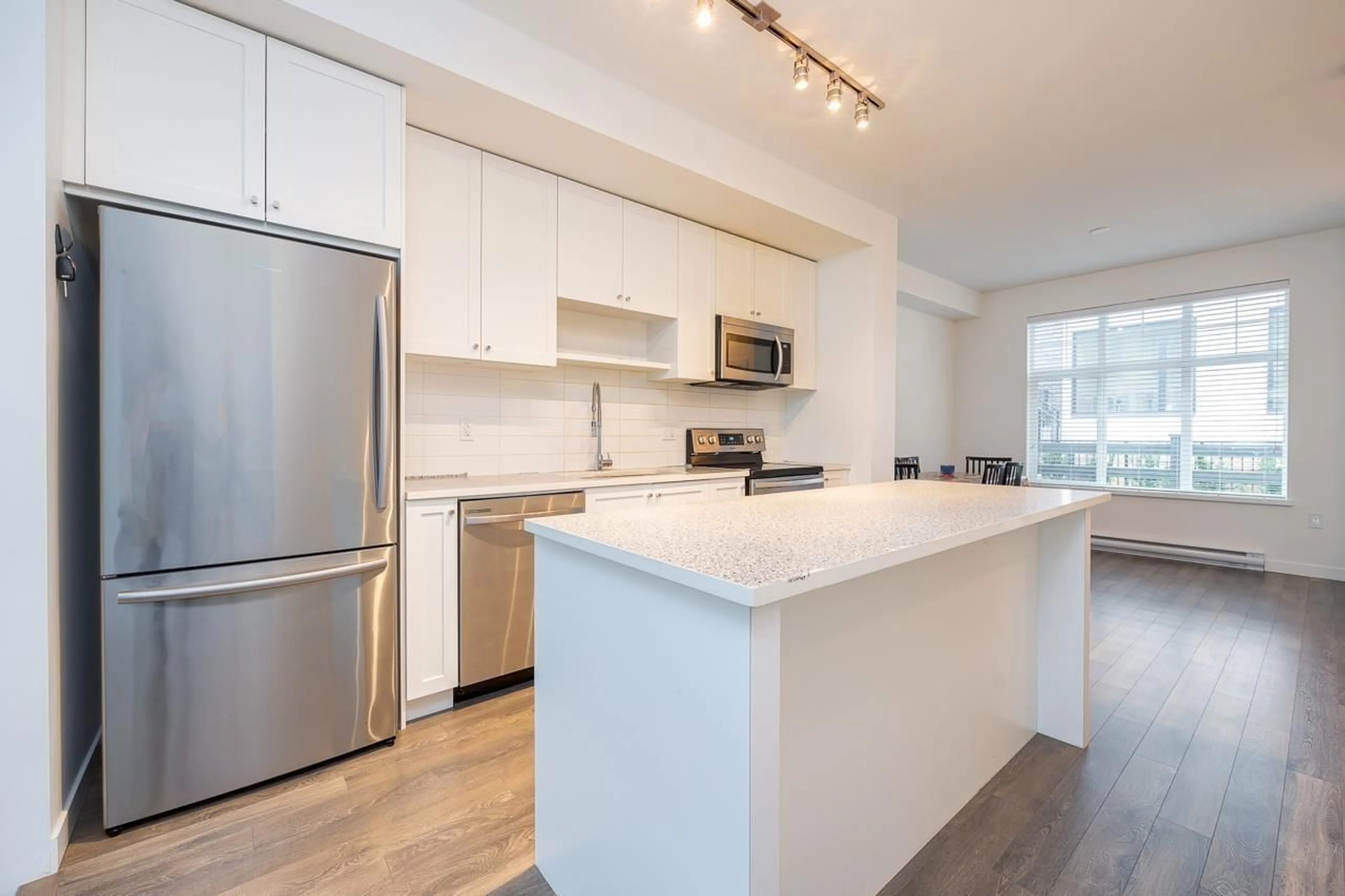 Open concept kitchen, unknown for 4 - 13629 81A AVENUE, Surrey British Columbia V3W3M4