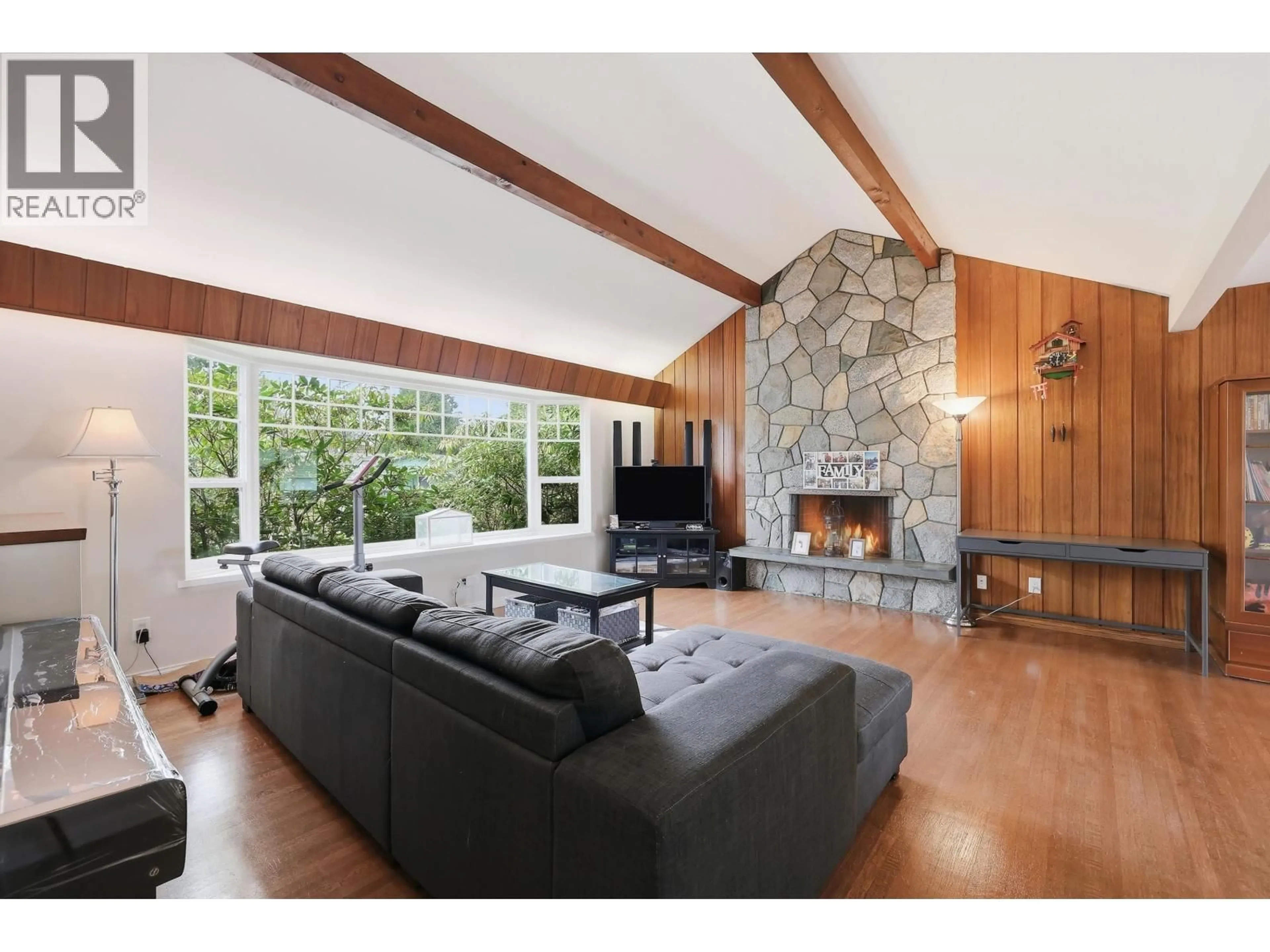 Living room with furniture, wood/laminate floor for 11936 WICKLOW WAY, Maple Ridge British Columbia V2X3A9