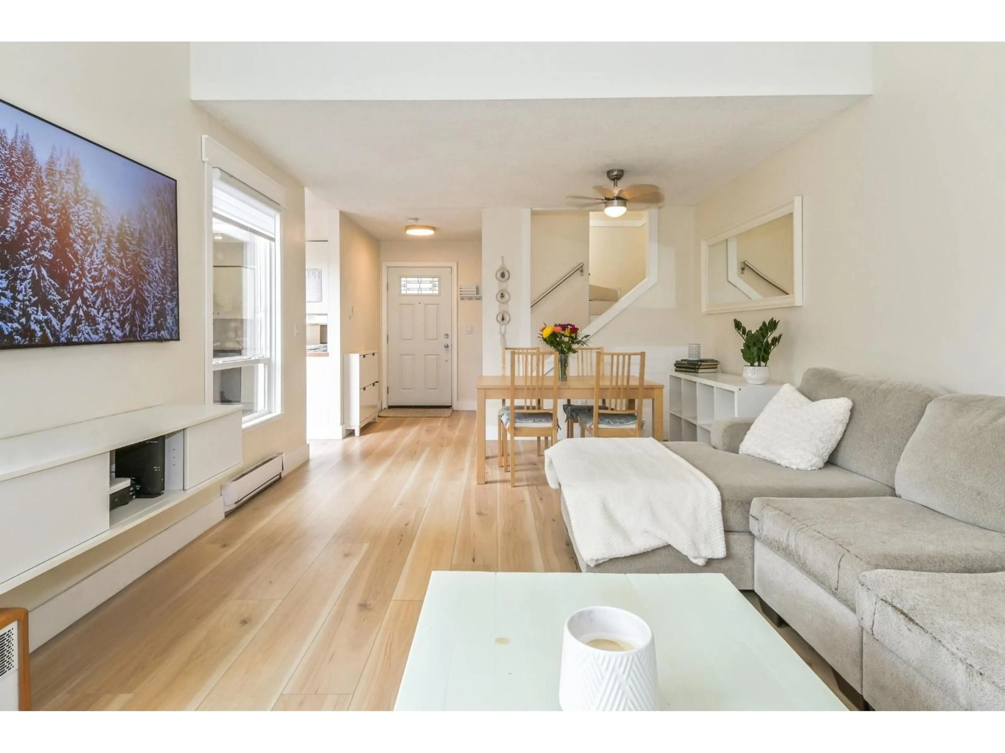 Living room with furniture, wood/laminate floor for 6294 GREENSIDE DRIVE WEST, Surrey British Columbia V3S5M8