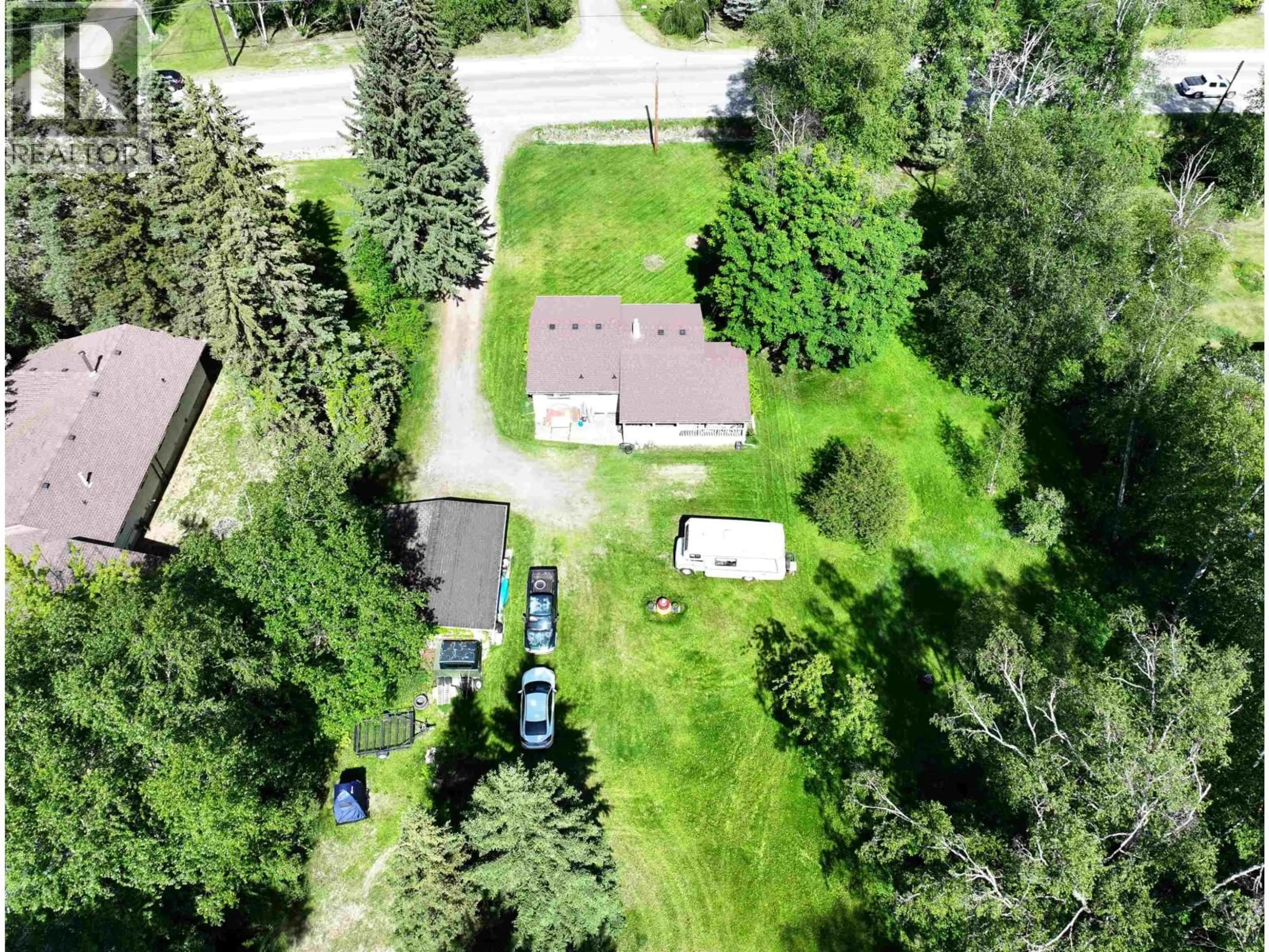 A pic from outside/outdoor area/front of a property/back of a property/a pic from drone, street for 1399 NORTH FRASER DRIVE, Quesnel British Columbia V2J1Z8
