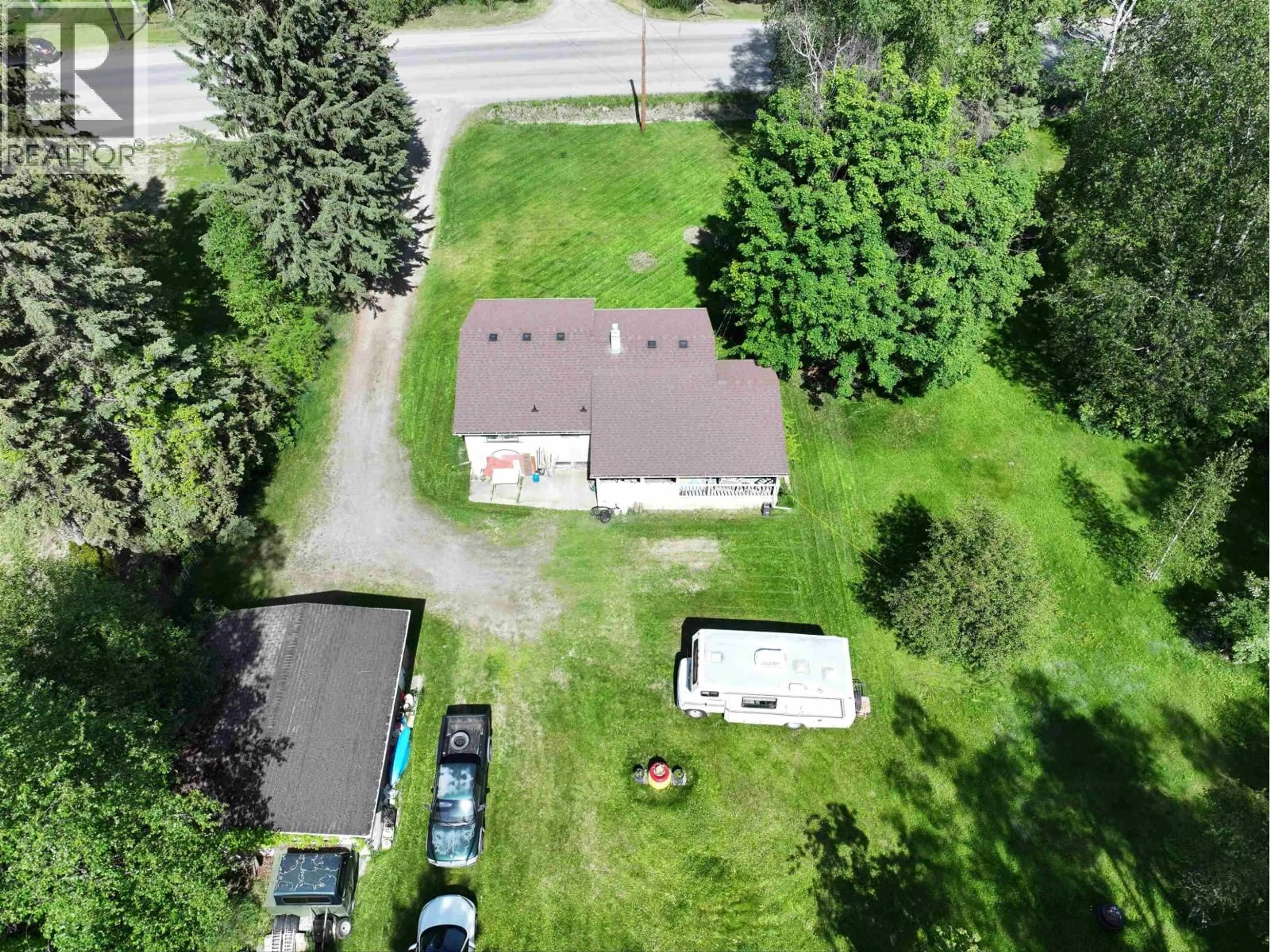 A pic from outside/outdoor area/front of a property/back of a property/a pic from drone, street for 1399 NORTH FRASER DRIVE, Quesnel British Columbia V2J1Z8