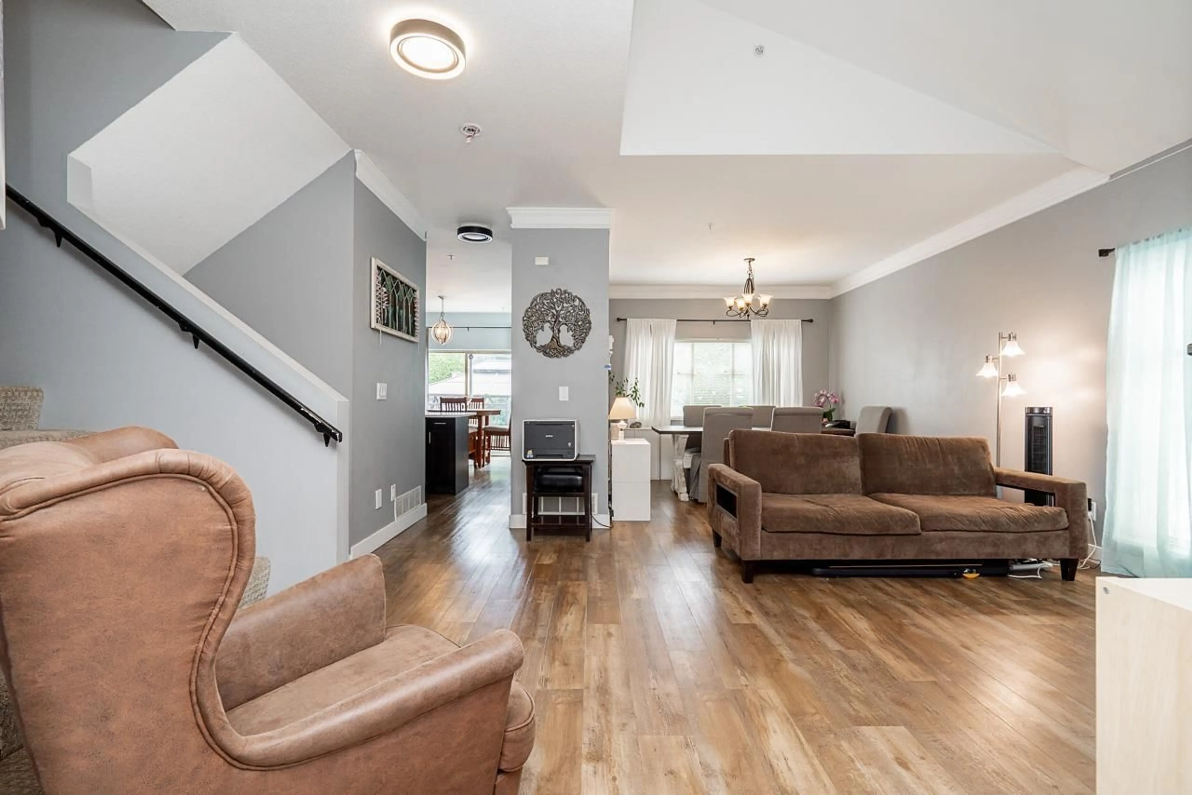 Living room with furniture, wood/laminate floor for 123 - 20820 87 AVENUE, Langley British Columbia V1M3W5
